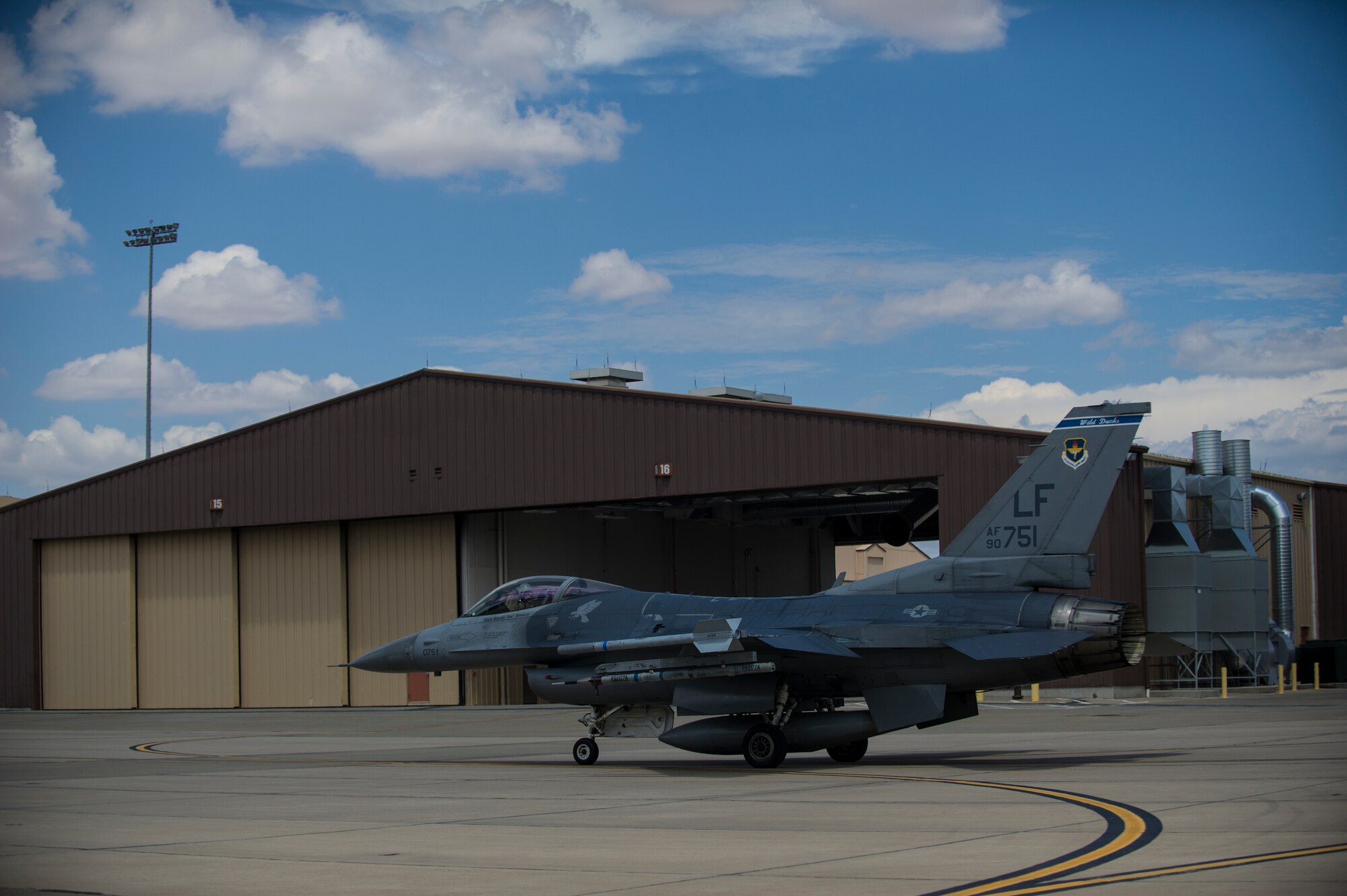 An F-16 Fighting Falcon taxis prior to takeoff for a training sortie over the White Sands Missile Range's 10,000 square mile range at Holloman Air Force Base, N.M., Aug. 5. The 54th FG is a detachment of Luke AFB, Ariz., and is stationed on Holloman to facilitate high-speed training, live fire weapons training, and night flying operations. (U.S. Air Force photo by Airman 1st Class Aaron Montoya / Released)