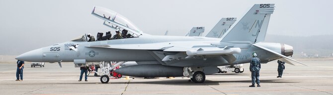 The EA-18G Growler waits before take-off at Naval Air Station Whidbey Island, Wash., August 7, 2014. Electronic attack missions, flown by the Growler, are extremely complex and vital to providing cover for friendly aircraft during joint-combat operations. (U.S. Air Force photo by Airman 1st Class Malissa Lott/RELEASED)