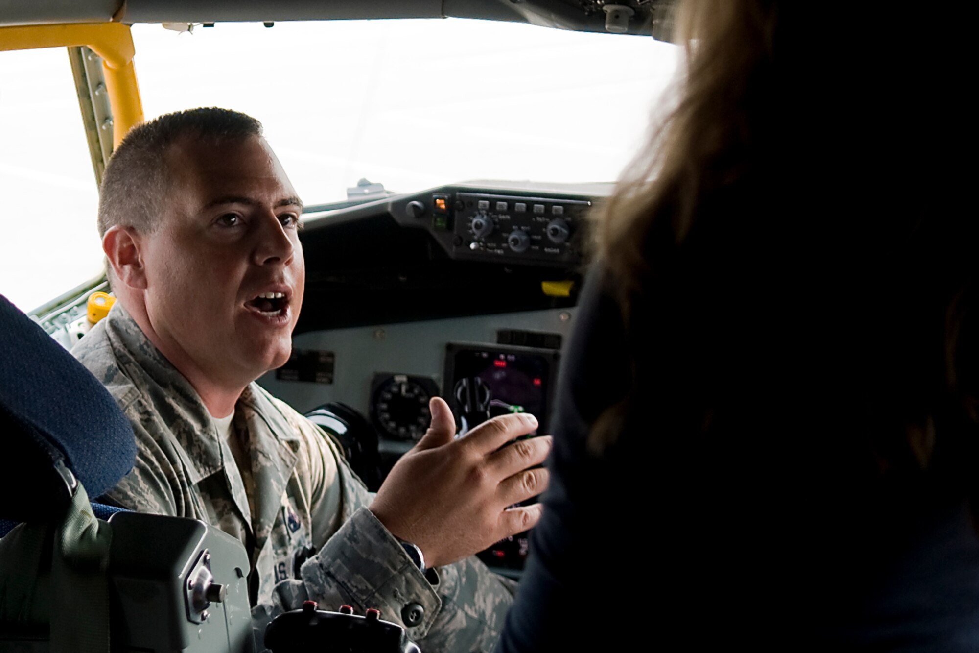 Master Sgt. Jason Washburn, 434th Aircraft Maintenance Squadron crew chief, explains to Molly Newell, legislative assistant for Rep. Luke Messer, the maintenance processes involved to keep a KC-135R Stratotanker mission ready during a visist to Grissom Air Reserve Base, Ind., Aug. 1, 2014. During her tour, Newell spoke with several military and civilian employees to get a better understanding of Grissom?s mission and the impact Grissom has on the local community. (U.S. Air Force photo/Tech. Sgt. Mark Orders-Woempner)