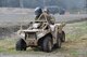 Reserve pararescuemen with the 304th Rescue Squadron, Portland Air National Guard Base, Ore., prepare to depart on an all-terrain vehicle during Operation Pathfinder Minuteman Aug. 5, 2014 at Camp Rilea, Ore. Operation Pathfinder Minuteman was a joint disaster response exercise involving Air Force reservists, Air and Army National Guardsmen, and local, state federal civilian medical personnel. (U.S. Air Force photo/2nd Lt. Anna-Marie Wyant)