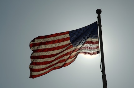 The United States flag flies above Joint Base San Antonio-Randolph, July 21, 2014.  (U.S. Air Force photo by Johnny Saldivar)