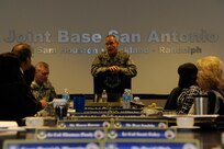 Brig. Gen. Bob LaBrutta, 502nd Air Base Wing and Joint Base San Antonio commander, explains the wing mission to the new  502nd ABW honorary commanders, July 2, 2014, at the 502nd ABW headquarters building on JBSA-Fort Sam Houston. The honorary commander program is intended to educate those with limited knowledge about the military or the installation while building relationships with members of the local community and encouraging those local civic leaders to share the Air Force story.  (U.S. Air Force photo by Airman 1st Class Stormy D. Archer)