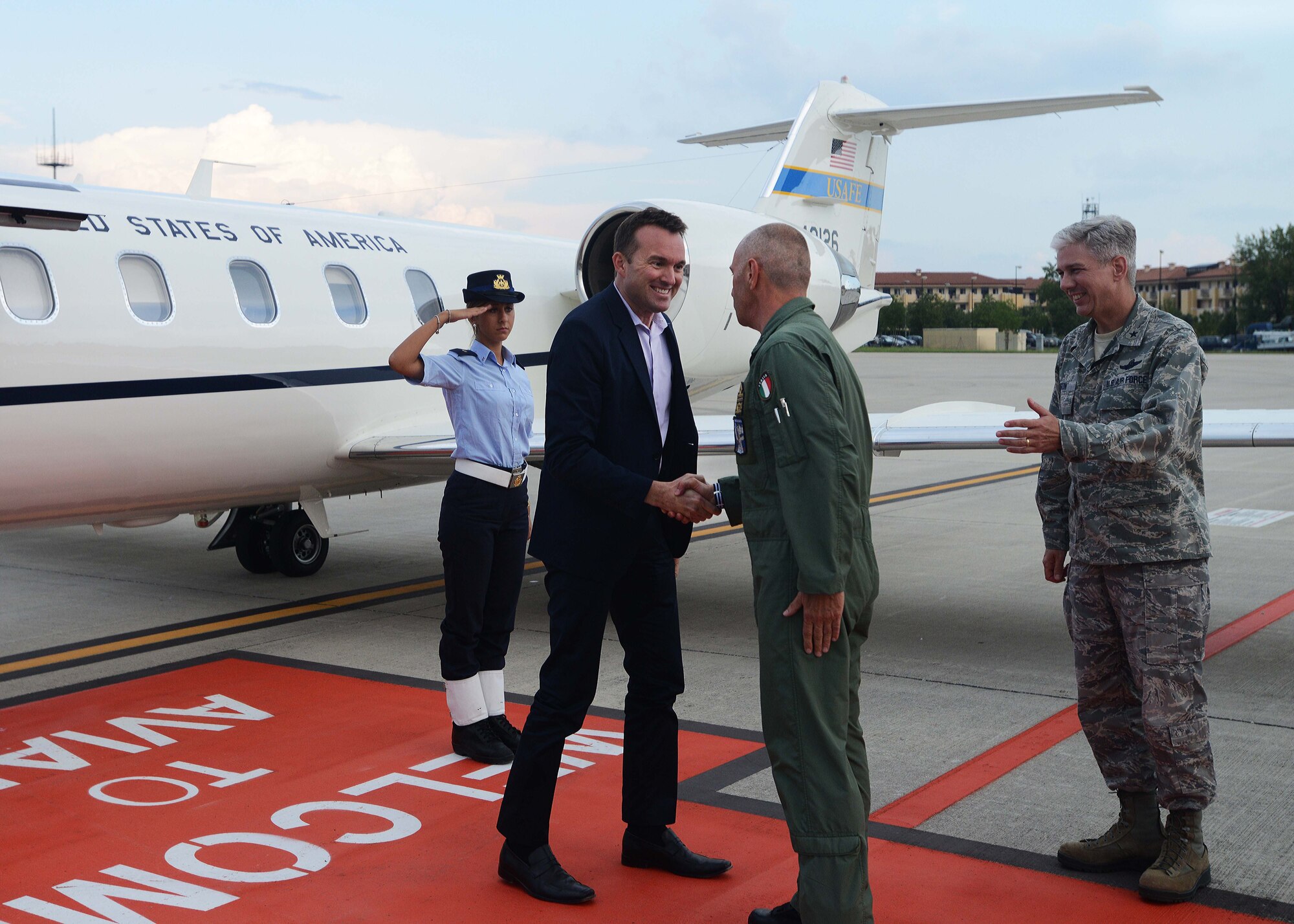 Under Secretary of the Air Force Eric Fanning is greeted by Maj. Gen. Roberto Nordio, Deployable Air Command and Control Center commander, and Brig. Gen. Barre Seguin, 31st Fighter Wing commander, Aug. 7, 2014, at Aviano Air Base, Italy. Fanning visited several squadrons, interacted with Airmen and hosted a base all-call. During the all-call, Fanning addressed topics such as budget, sequestration and the unique capabilities the Air Force brings to combatant commanders. (U.S. Air Force photo/Airman 1st Class Deana Heitzman) 