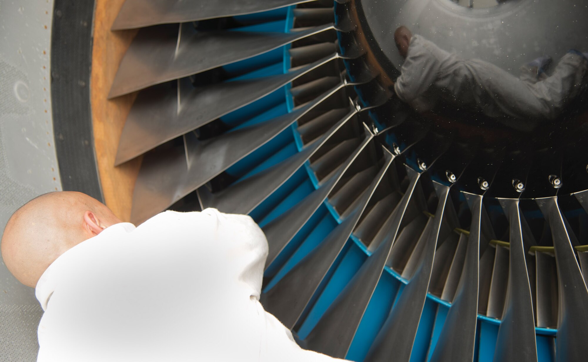 TRAVIS AIR FORCE BASE, Calif. -- Tech. Sgt. Johnny Martinez, 749th Aircraft Maintenance Squadron, thoroughly inspects the left wing engine of a KC-10 Extender after a flight Tuesday on the Travis Air Force Base flightline. (U.S. Air Force photo/Senior Airman Madelyn Brown)