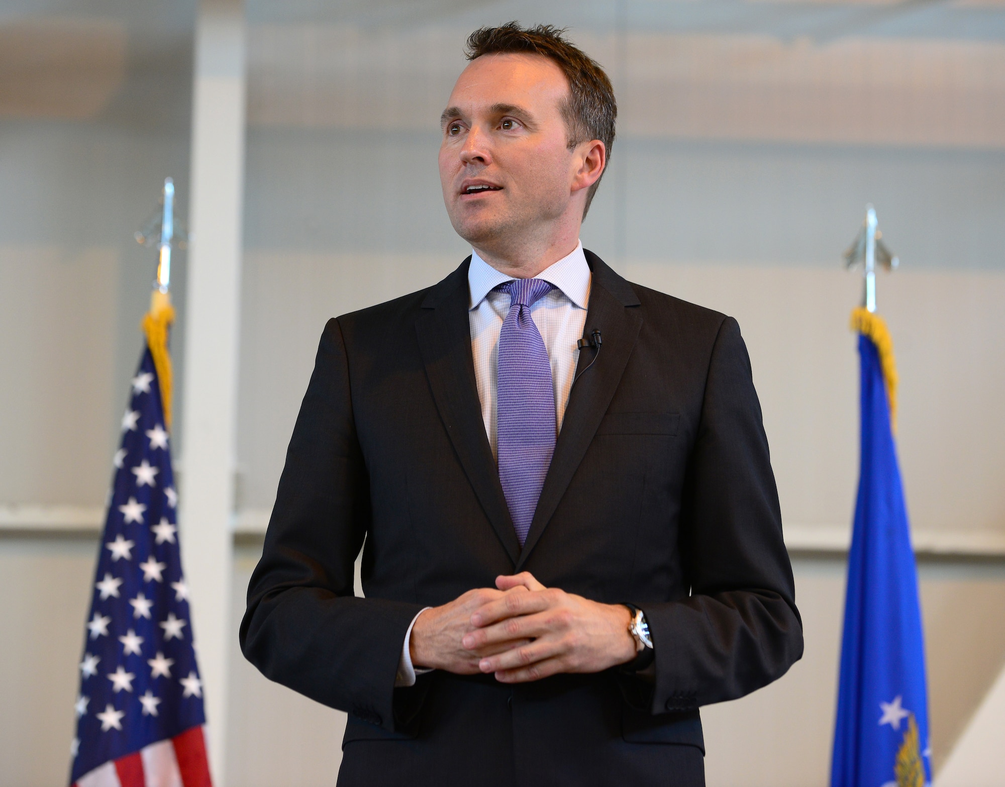 Under Secretary of the Air Force Eric Fanning speaks at a wing all-call, Aug. 8, 2014, at Aviano Air Base, Italy. Fanning visited several squadrons, interacted with Airmen and hosted a base all-call. During the all-call, Fanning addressed topics such as budget, sequestration and the unique capabilities the Air Force brings to combatant commanders. (U.S. Air Force photo/Senior Airman Matthew Lotz)