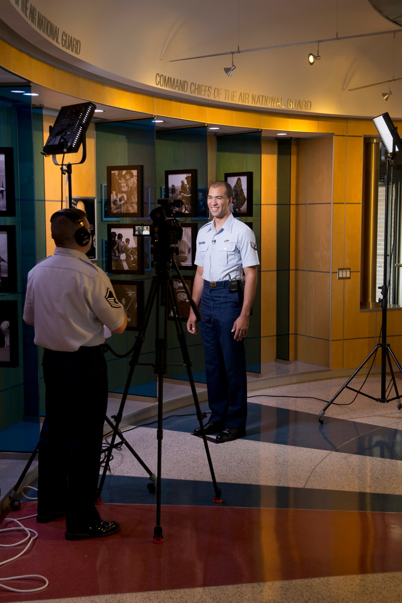 Master Sgt. Matthew Hilborn, a broadcaster assigned to Air National Guard Readiness Center Public Affairs, Joint Base Andrews, Maryland interviews Senior Airman Christian Goldsmith during Focus on the Force Week August 6, 2014. Goldsmith is a geospatial intelligence analyst from the 150th Special Operations Wing, New Mexico ANG and is the Airman of the Year. Focus on the Force gathers senior enlisted leaders to openly discuss concerns, receive feedback from the junior enlisted and tell the exceptional stories of ANG Airmen throughout the ANG's 54 states, territories and the District of Columbia. (Air National Guard photo by Master. Sgt. Marvin R. Preston/Released)