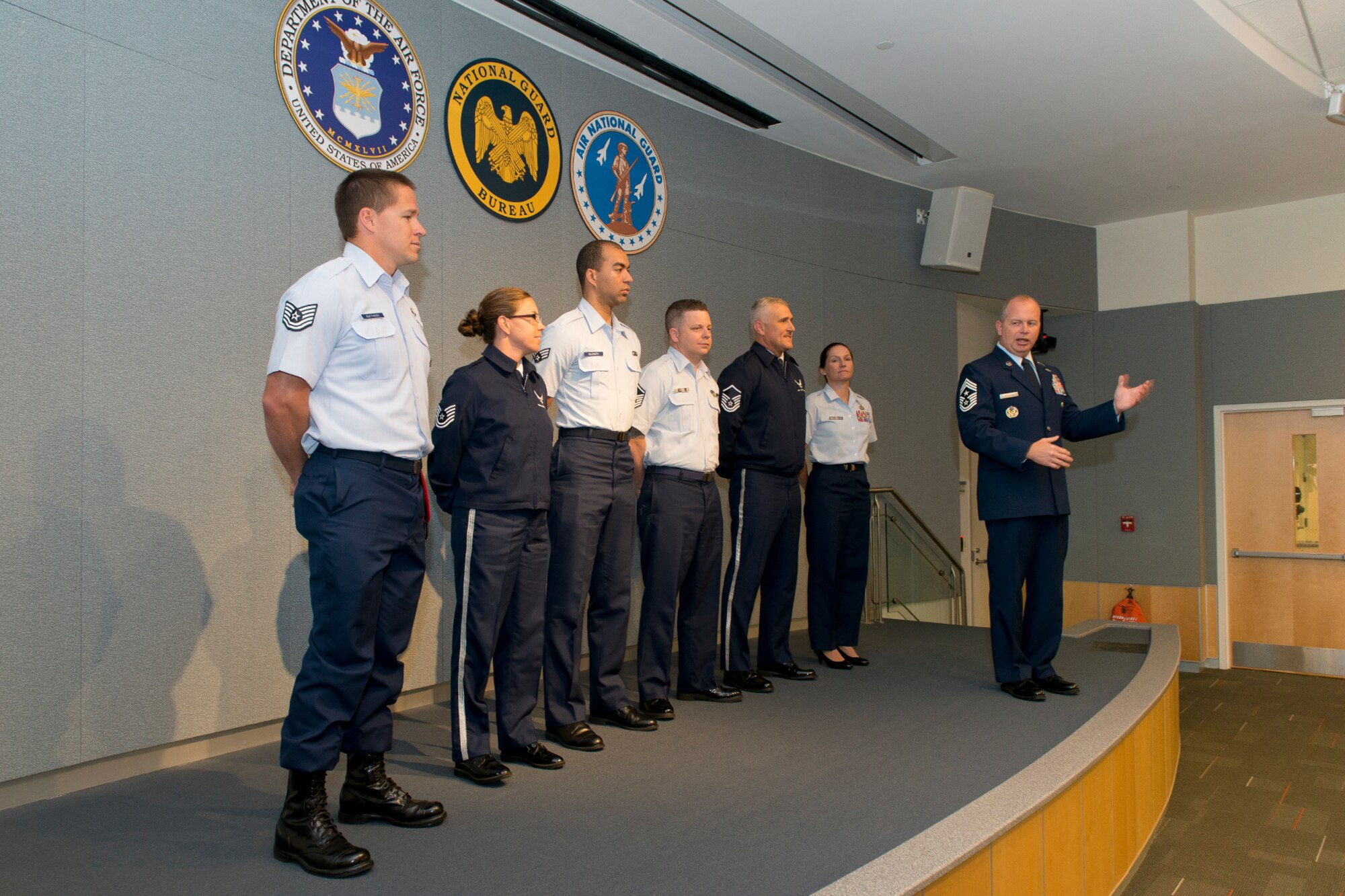 Chief Master Sgt. James W. Hotaling, the command chief of the Air National Guard, introduces the ANG Outstanding Airmen of the Year during the Focus on the Force breakfast August 6, 2014. The Airmen recognized were (left to right) Tech. Sgt. Doug Matthews, Non-Commissioned Officer of the Year, Technical Sgt. Amy Ough, Honor Guard Member of the Year, Senior Airman Christian Goldsmith, Airman of the Year, Master Sgt. Joseph G. Ashwood, Senior Non-Commissioned Officer of the Year, Master Sgt. David Coker, Honor Guard Program Manager of the Year, and Master Sgt. Linda Schwartzlow, First Sgt. of the Year. (Air National Guard photo by Master. Sgt. Marvin R. Preston/Released)