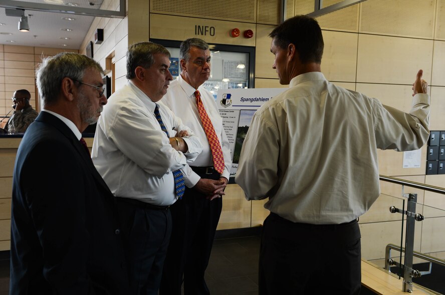 Jude Sorg, 52nd Force Support Squadron deputy director from Fort Wayne, Ind., talks about the Eifel Powerhaus fitness center with Veterans of Foreign Wars leadership at Spangdahlem Air Base, Germany, Aug. 7, 2014. Sorg showcased new equipment and space the facility provides to Airmen. (U.S. Air Force photo by Airman 1st Class Kyle Gese/Released)