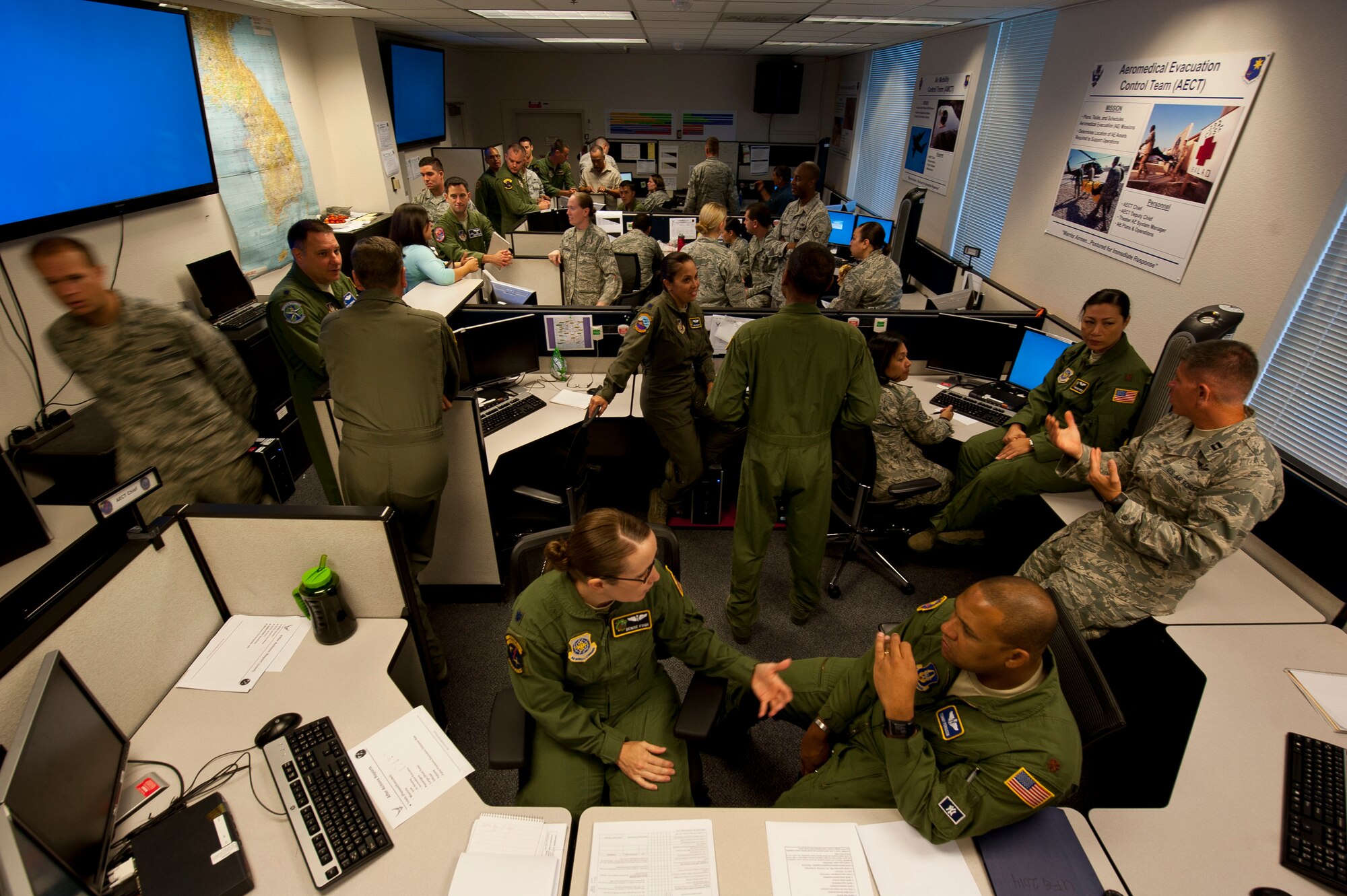 Airmen from the 15th Air Mobility Operations Squadron host Exercise Home Plate 14-03 at Travis Air Force Base from July 21 to 25, 2014. Exercise Home Plate is a command and control exercise with 7 units participating in scenarios in prepare for a real-world contingency in Korea. (U.S. Air Force photo/Tech. Sgt. Matthew Hannen) 