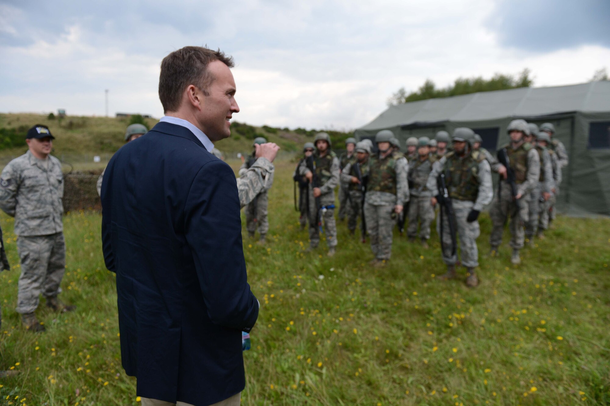 Under Secretary of the Air Force Eric Fanning speaks to Airmen assigned to the 606th Air Control Squadron during a base familiarization visit of Spangdahlem Air Base, Germany, Aug. 5, 2014. The 606th ACS demonstrated their combat readiness capabilities through a display of training operations. (U.S. Air Force photo by Senior Airman Gustavo/Released ) 