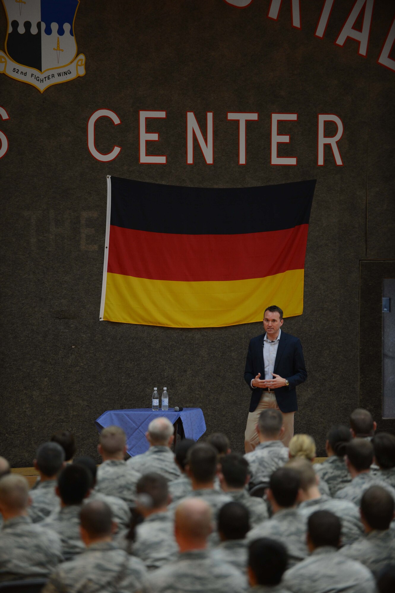 Under Secretary of the Air Force Eric Fanning speaks to the Airmen of Spangdahlem Air Base at the Skelton Memorial Fitness Center during a base familiarization visit Aug. 5, 2014. Fanning spoke to the wing about current topics in the Air Force and answered questions ranging from budget and readiness to promotion and force reduction. (U.S. Air Force photo by Senior Airman Gustavo Castillo/Released) 