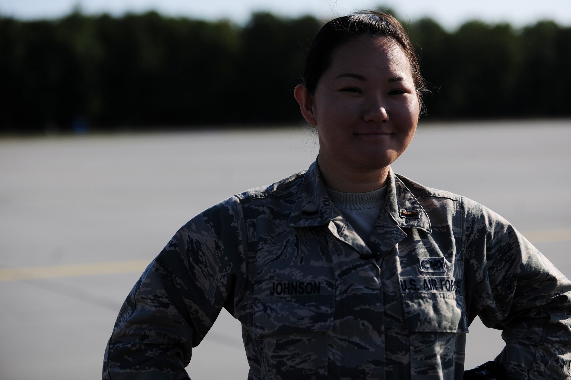 U.S. Air Force 2nd Lt. Su Johnson, 86th Aircraft Maintenance Squadron sortie support officer in charge, stands on the flightline at Powidz Air Base, Poland, Aug. 8, 2014. During this flying training deployment, Johnson and other Airmen from the 86th AXMS worked diligently to service and maintain two C-130J Super Hercules aircraft. (U.S. Air Force photo by Staff Sgt. Jarad A. Denton/Released)