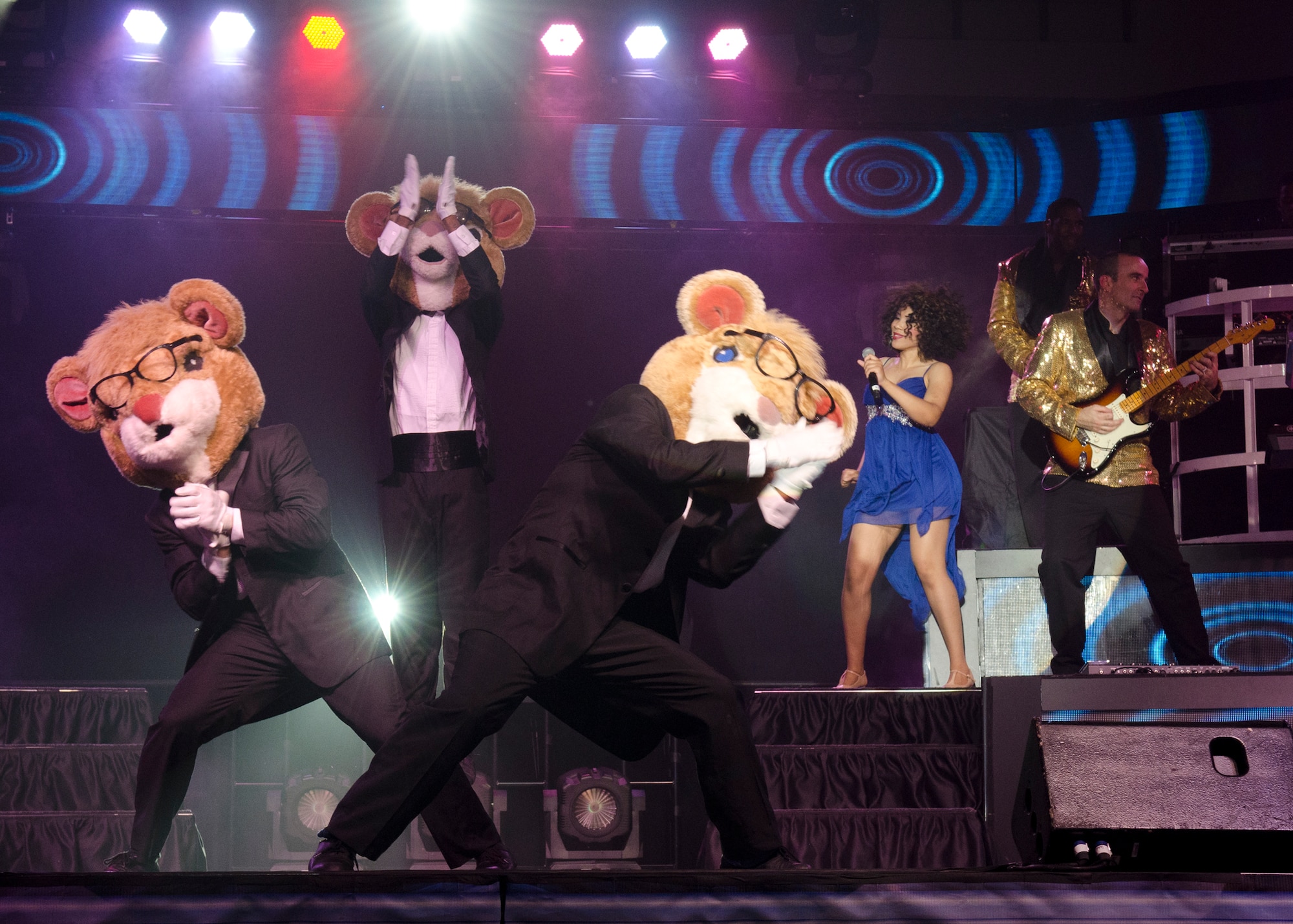 Tops in Blue performed at the Coral Reef Fitness Center with a tribute in song to military members Aug. 6, 2014, on Andersen Air Force Base, Guam. Tops in Blue, now in its 61st year, tours Air Force installations around the world to perform for Airmen and their families. The organization tours more than 20 countries and performs nearly 150 shows each year.  (U.S. Air Force photo by Senior Airman Katrina M. Brisbin)