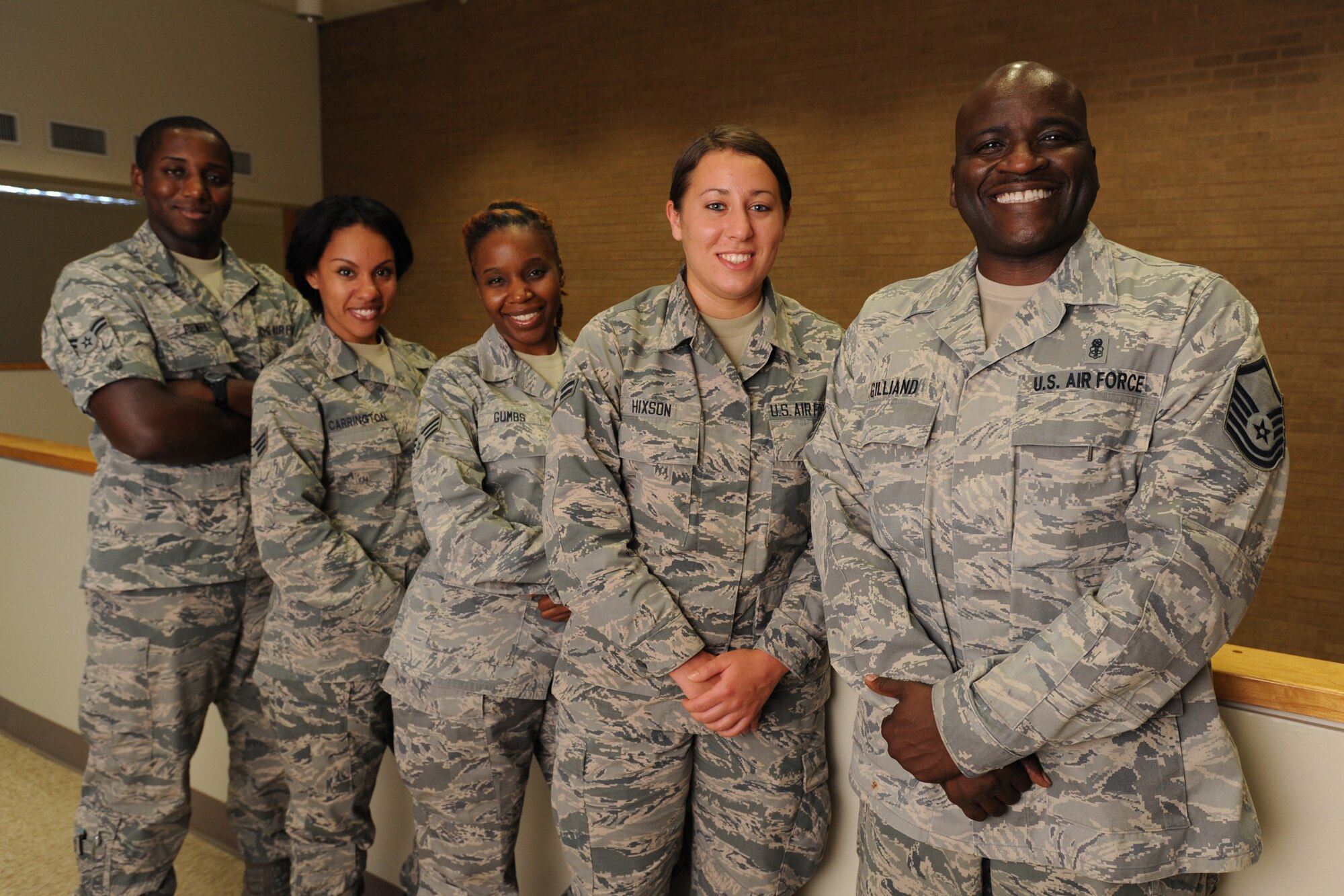POPE ARMY AIRFIELD, N.C. - Diet technicians with the 440th Medical Squadron (From left to right), Airman 1st Class Anthony Powell, Airman 1st Class Kristina Carrington, Senior Airman Shameka Gumbs, Airman 1st Class Allison Hixson and Master Sgt. Houston Gilliand, pose for a group portrait here, Aug. 9.  Air Force diet technicians ensure their patients' diets are nutritionally optimized for maximum recovery performance.  (U.S. Air Force photo: Tech. Sgt. Peter R. Miller)