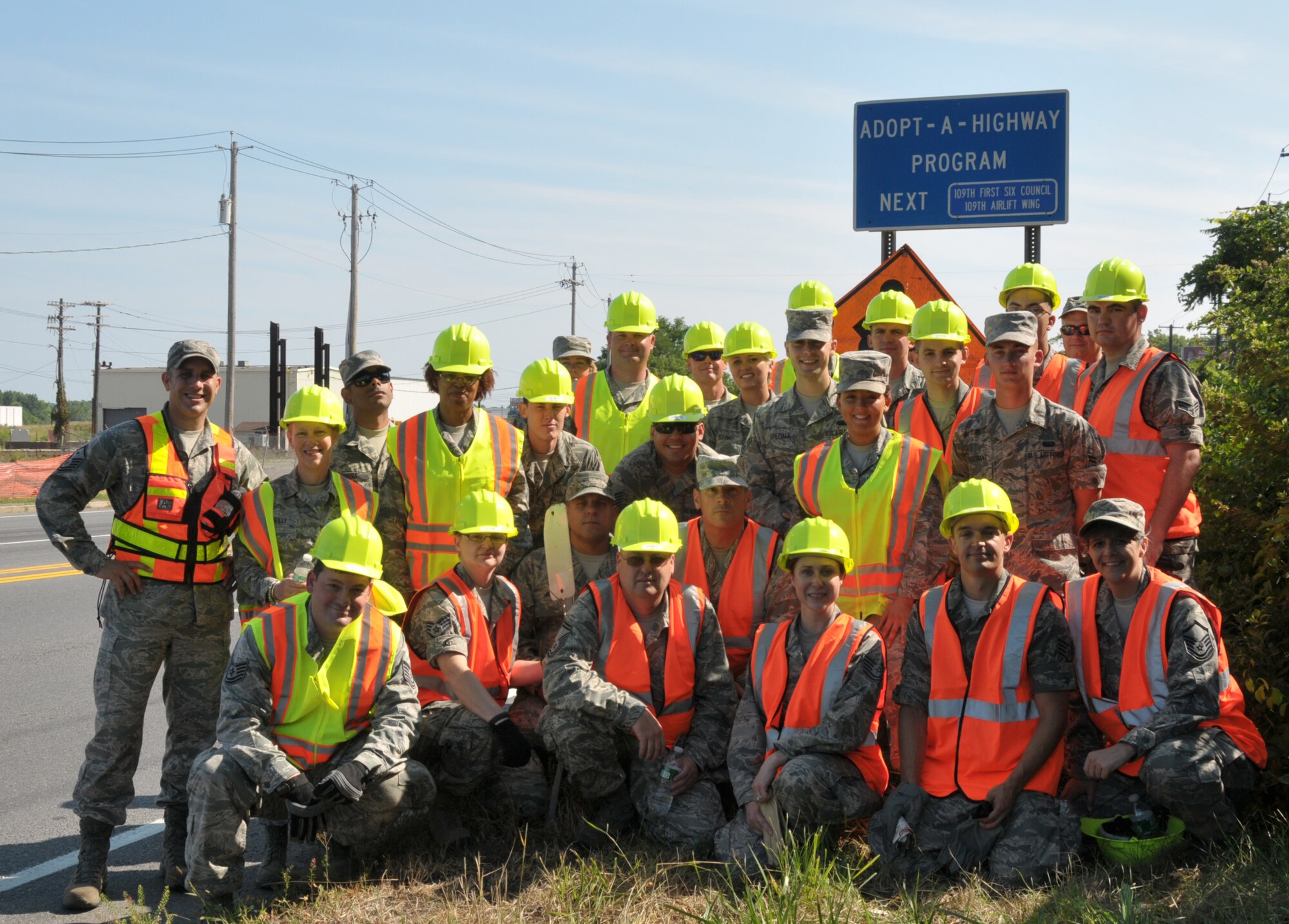 Airmen with the 109th Airlift Wing participated in the Adopt-A-Highway program in Schenectady, New York, on Aug. 10, 2014. The First Six Council planned the event to clean up the Wing's neighboring community and will be out four times a year. (U.S. Air National Guard photo by Tech. Sgt. Catharine Schmidt/Released)