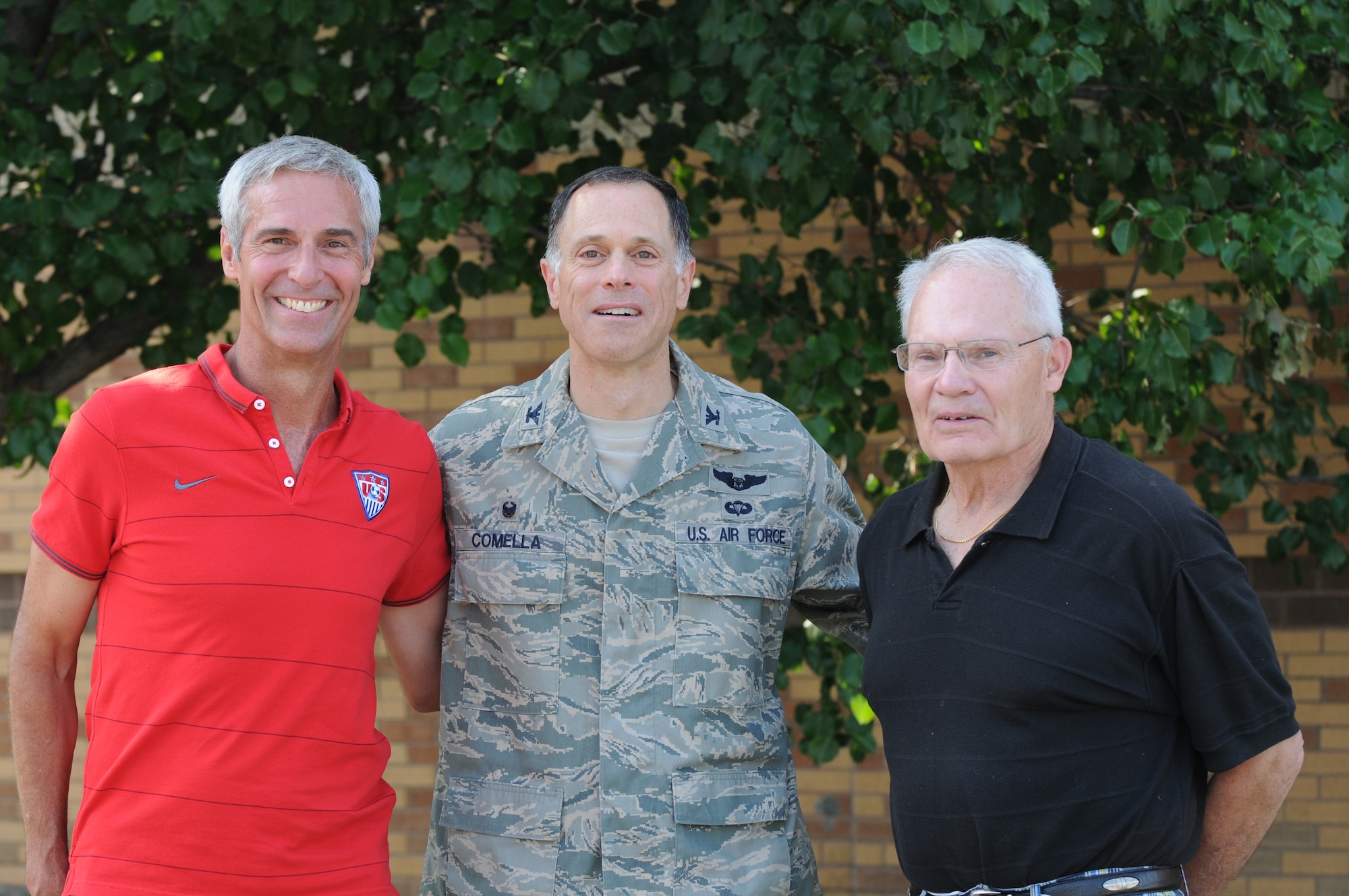 New York Air National Guard Col. Michael V. Comella, Commander of the 152nd Air Operations Group (AOG) is joined by former 152nd Commanders, Brig. Gen. David J. Coons (Right) and Col. Mark Murphy (retired) at Hancock Field in Syracuse, NY on 9 Aug. 2014.  The Commanders were enjoying the Inaugural 152 Alumni Open House.  (New York Air National Guard photo by Senior Airman Duane Morgan/Released)
