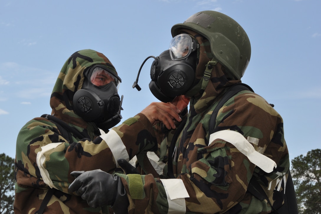 Airmen from the 916th Air Refueling Wing, Seymour Johnson Air Force Base, North Carolina, participate in a Chemical, Biological, Radiological and Nuclear defense skills assessment during Exercise Razor Sharp, June 2014. (USAF photo by MSgt. Wendy Lopedote, 916ARW/PA)