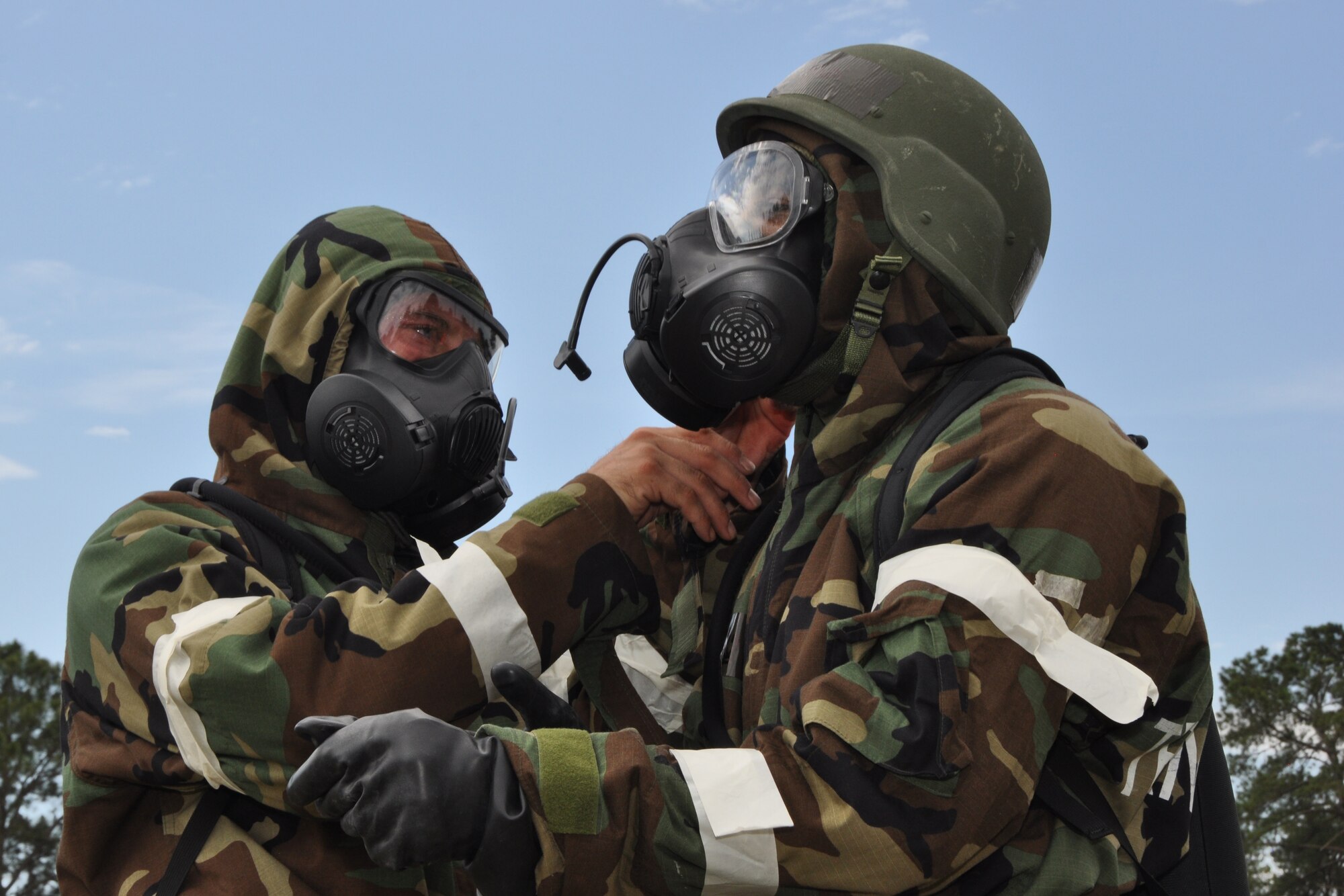 Airmen from the 916th Air Refueling Wing, Seymour Johnson Air Force Base, North Carolina, participate in a Chemical, Biological, Radiological and Nuclear defense skills assessment during Exercise Razor Sharp, June 2014. (USAF photo by MSgt. Wendy Lopedote, 916ARW/PA)