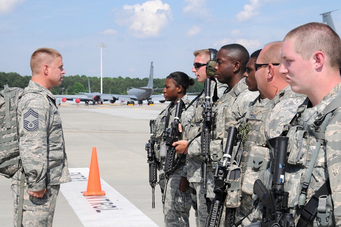 Chief Master Sergeant Karl Wolf, 916th Security Forces Squadron, addresses 916th SFS Airmen on the KC-135 Stratotanker ramp, Seymour Johnson Air Force Base, North Carolina, June 2014. (USAF photo by TSgt. Scotty Sweatt, 916ARW/PA)