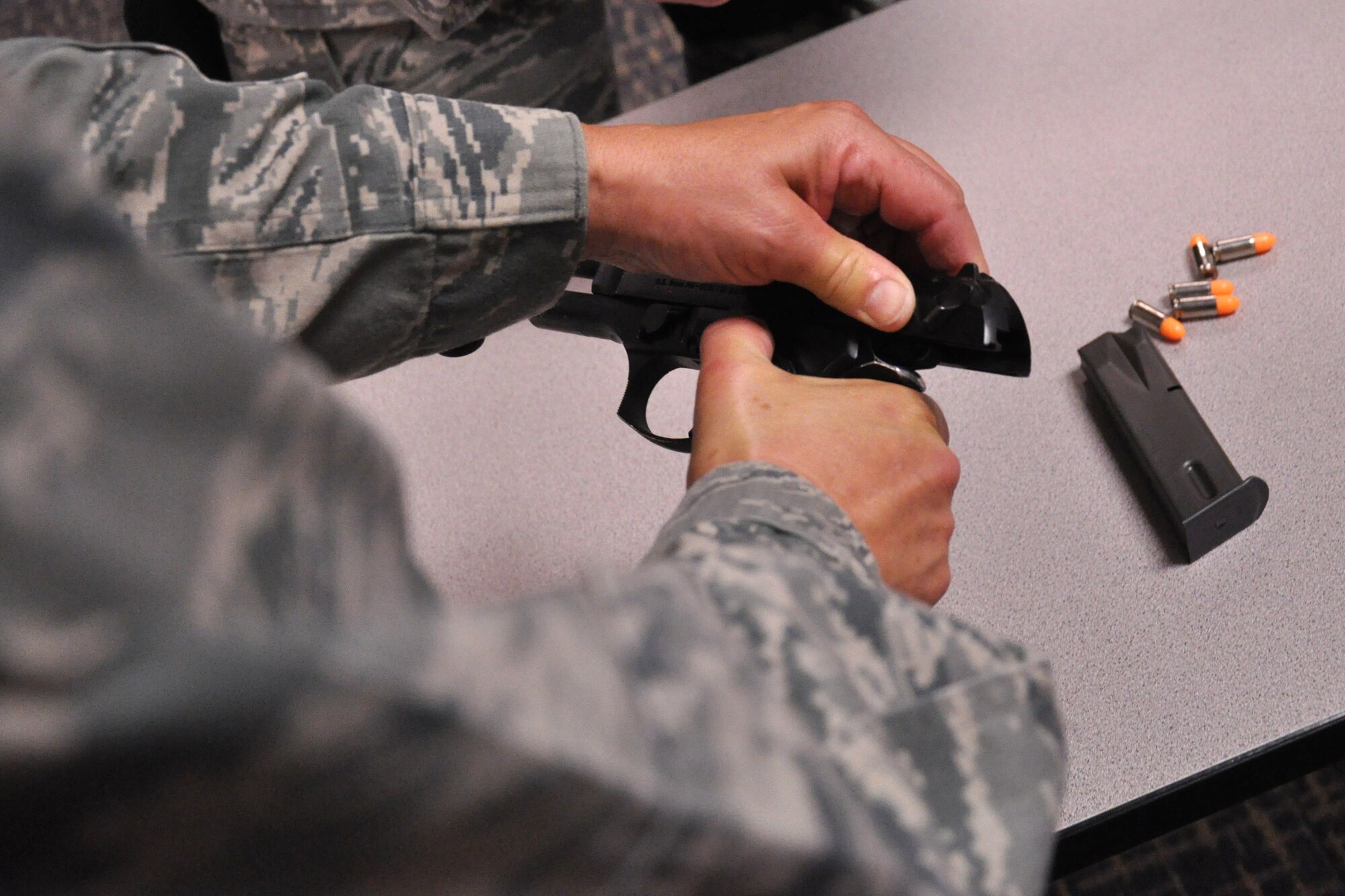 An Airman from the 916th Air Refueling Wing, Seymour Johnson Air Force Base, North Carolina, participates in a weapons skills assessment during Exercise Razor Sharp, June 2014. (USAF photo by SSgt. Alan Abernethy, 916ARW/PA)