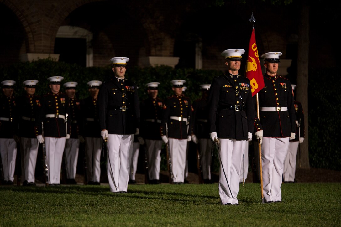 Marines from Marine Barracks Washington, D.C., perform during a Friday Evening Parade at the Barracks, August 8. (Official Marine Corps photo by Cpl. Larry Babilya/Released)