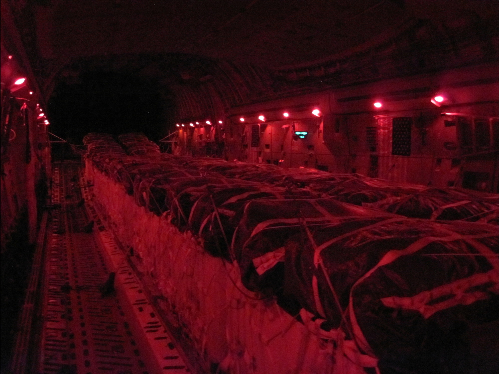 Pallets of bottled water are loaded aboard a U.S. Air Force C-17 Globemaster III aircraft in preparation for a humanitarian airdrop over Iraq Aug. 8, 2014. Airmen with the 816th Expeditionary Airlift Squadron airdropped 40 bundles of water for displaced citizens in the vicinity of Sinjar, Iraq. The president authorized U.S. Central Command to conduct military operations in support of humanitarian aid deliveries and targeted airstrikes in Iraq to protect U.S. personnel and interests, in response to activities conducted by Islamic State in Iraq and the Levant (ISIL) terrorists. (U.S. Air Force photo by Staff Sgt. Vernon Young Jr)