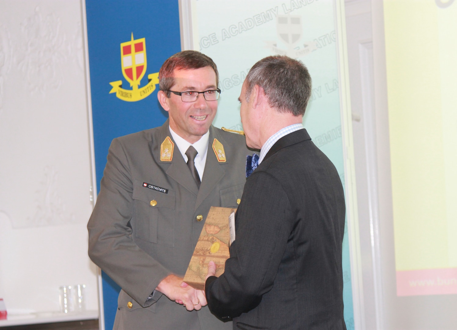 NDU Provost, Dr. John Yaeger, presents a gift to LtGen Erich Csitkovits, Commandant of the Austrian National Defence Academy.
