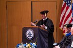 Retired Army Gen. Keith Alexander delivered the keynote address at the National Intelligence University’s graduation ceremony July 25. Photos courtesy of NIU