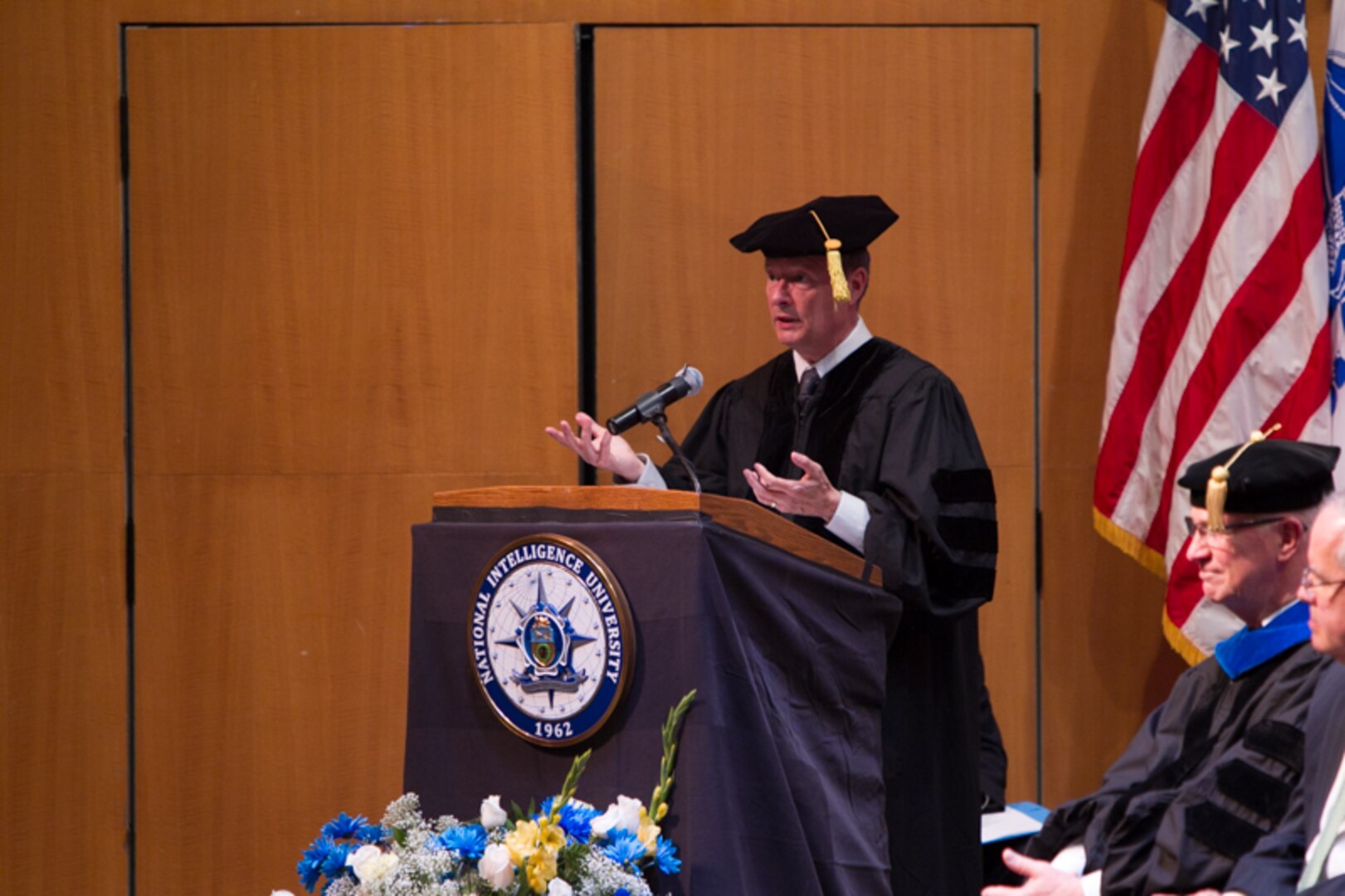 Retired Army Gen. Keith Alexander delivered the keynote address at the National Intelligence University’s graduation ceremony July 25. Photos courtesy of NIU