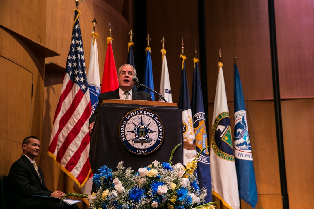 Then-DIA Deputy Director David Shedd, now acting DIA director, speaks to students at NIU’s graduation ceremony July 25.