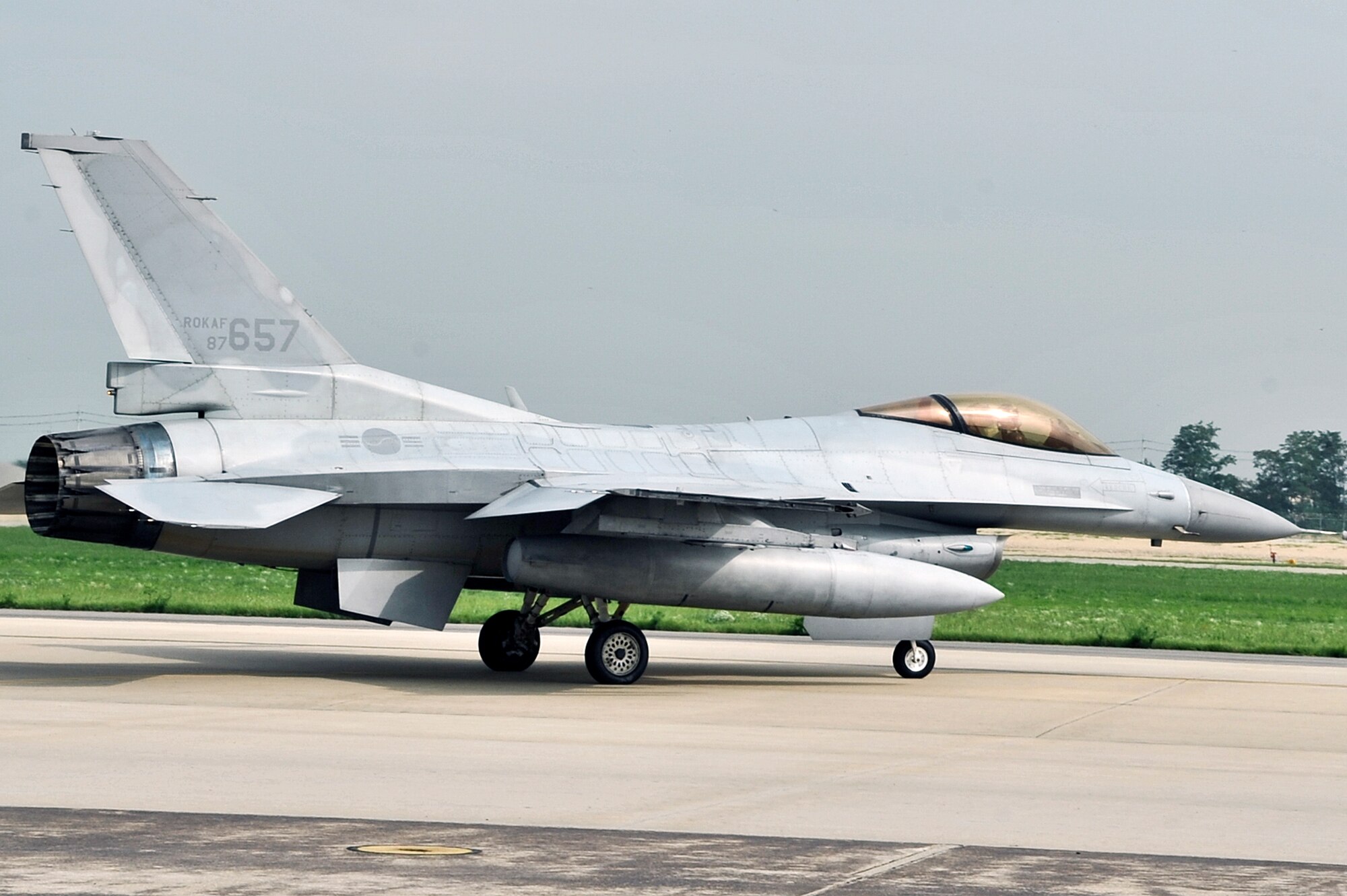 A Republic of Korea air force F-16, from the 161st Squadron, taxies to the runway during the Buddy Wing 14-6 exchange program on Osan Air Base, ROK, July 31, 2014. The program is an opportunity for U.S. Air Force and ROKAF pilots to interact during a smaller scale exercise. (U.S. Air Force photo by Senior Airman Matthew Lancaster)