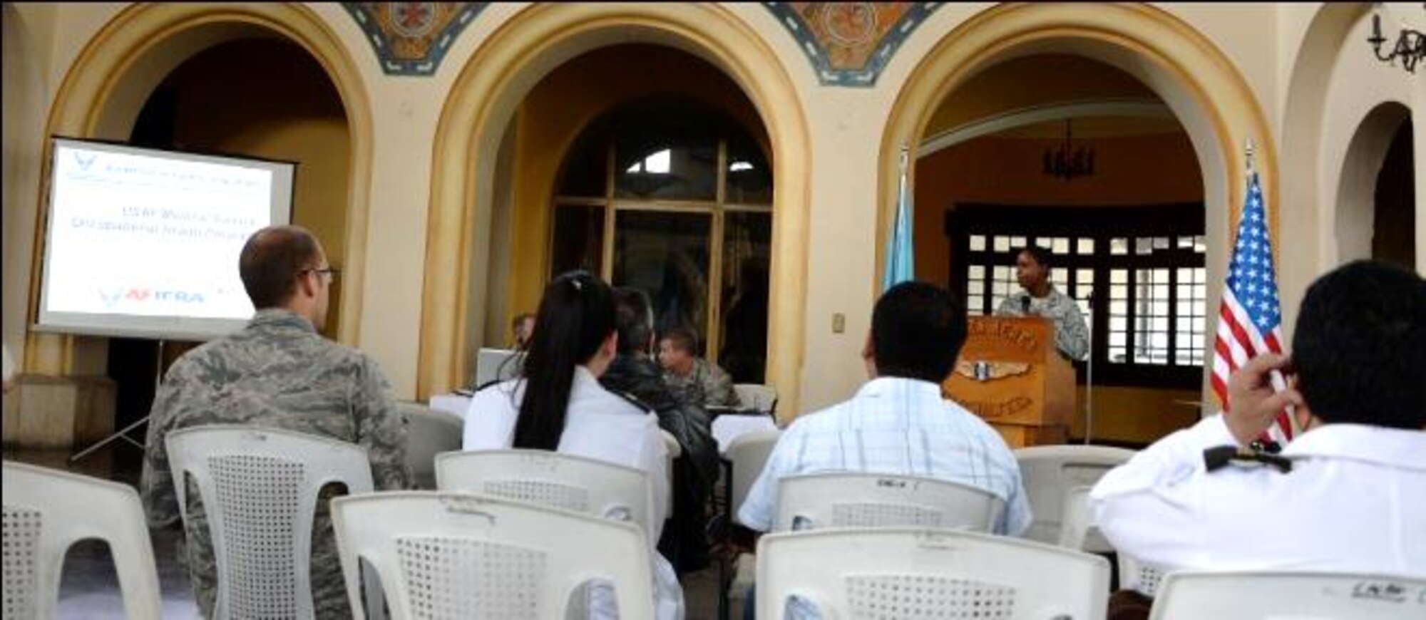 Capt. DeAndre Opoku, 12th Air Force (Air Forces Southern) International Health Specialist, briefs a group of medical professional on the importance of public health and how it relates to mission success during a subject matter expert exchange in Guatemala City, Guatemala, Aug. 6, 2014.  Airmen from members AFOUTH along with National Guard Airmen from the 189th Airlift Wing in Arkansas participated in the exchange, which focused on establishing a variety of medical programs.  (U.S. Air Force photo by Tech. Sgt. Heather R. Redman/Released)