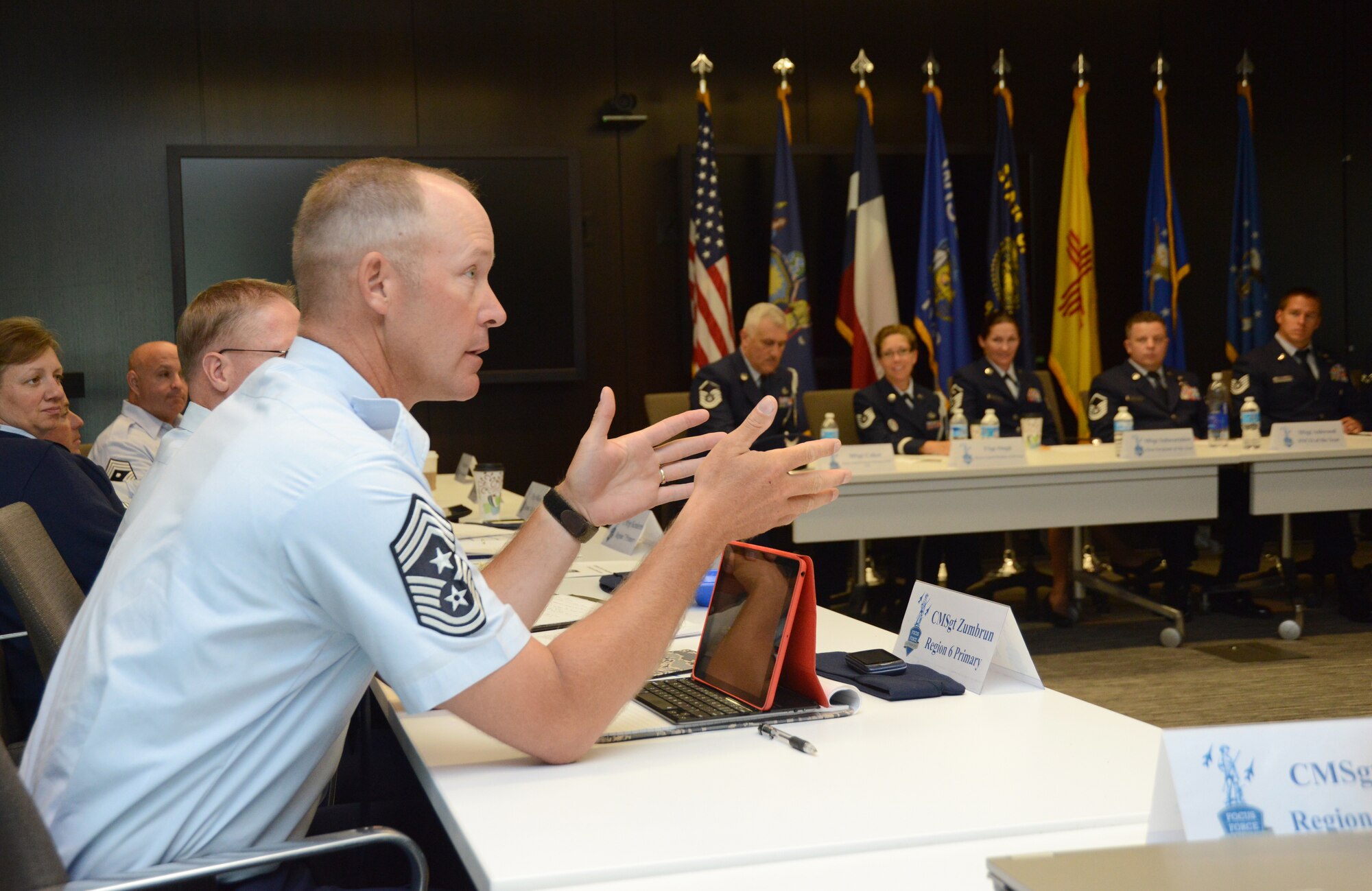 Chief Master Sgt. Tim Zumbrun, command chief master sergeant of the Montana Air National Guard, responds to a question from the Air National Guard's 2014 Outstanding Airmen of the Year during the Enlisted Field Advisory Council meeting at the Air National Guard Readiness Center on Joint Base Andrews, Md., Aug. 5, 2014, as part of Focus on the Force week. The OAY Airmen bring the perspective of the 91,000 enlisted Airmen across the ANG to address challenges facing the enlisted force. (U.S. Air National Guard photo by Senior Airman John E. Hillier/Released)