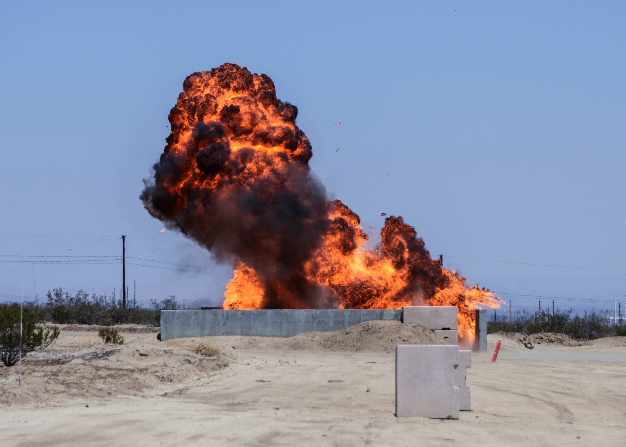 A group of new commanders gathered at the 412th Civil Engineering building Aug. 8 for a tour of the facility and to get with CE's responsibilities and capabilities, which  ended with a bang at the Explosive Ordinance Disposal compound.  (U.S. Air Force photo by Rebecca Amber)