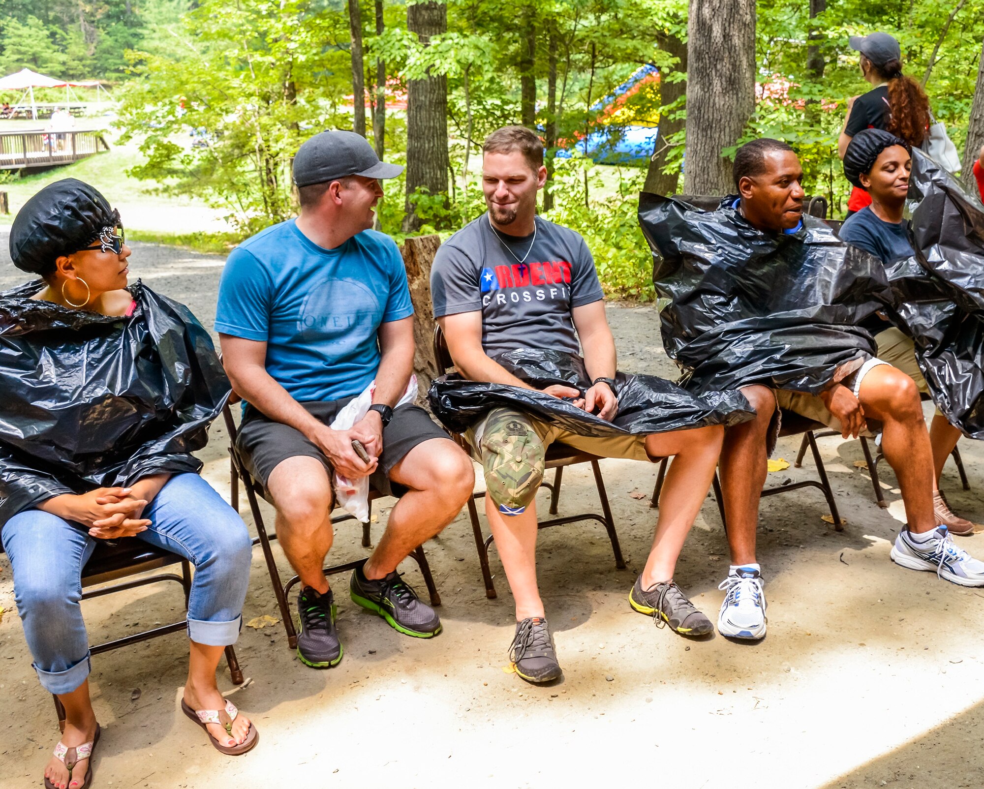 "Winners" of the pie-in-the-face contest await their pies. (photo by Mike Hastings)