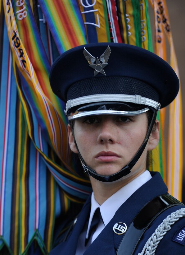 Airman 1st Class Loryn Grieb, United States Air Force Color Team member, waits for the Bud Billiken Parade to start in Chicago, Il., August 9, 2014. The 40-person formation marched in front of a live and televised audience of millions of people. (U.S. Air Force photo/ Senior Airman Nesha Humes)