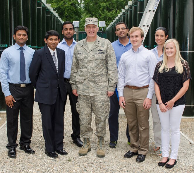 Maj. Gen. Tom Masiello, Air Force Research Laboratory commander, joined University of Dayton Research Institute researchers August 6 during a tour of UDRI’s Outdoor Algae Research Facility.  Air Force Research Laboratory is teaming with UDRI on using algae both as an alternative biofuel source and to capture carbon dioxide to reduce impacts of global warming.  From left are Nilesh Chavada, Moshan Kahandawala, Ph.D., Saikumar Chalivendra, Maj. Gen. Masiello, Albert Vam, David Connally, Liliana Martinez, and Emily Meredith.  (U.S. Air Force photo/Mikee Huber)