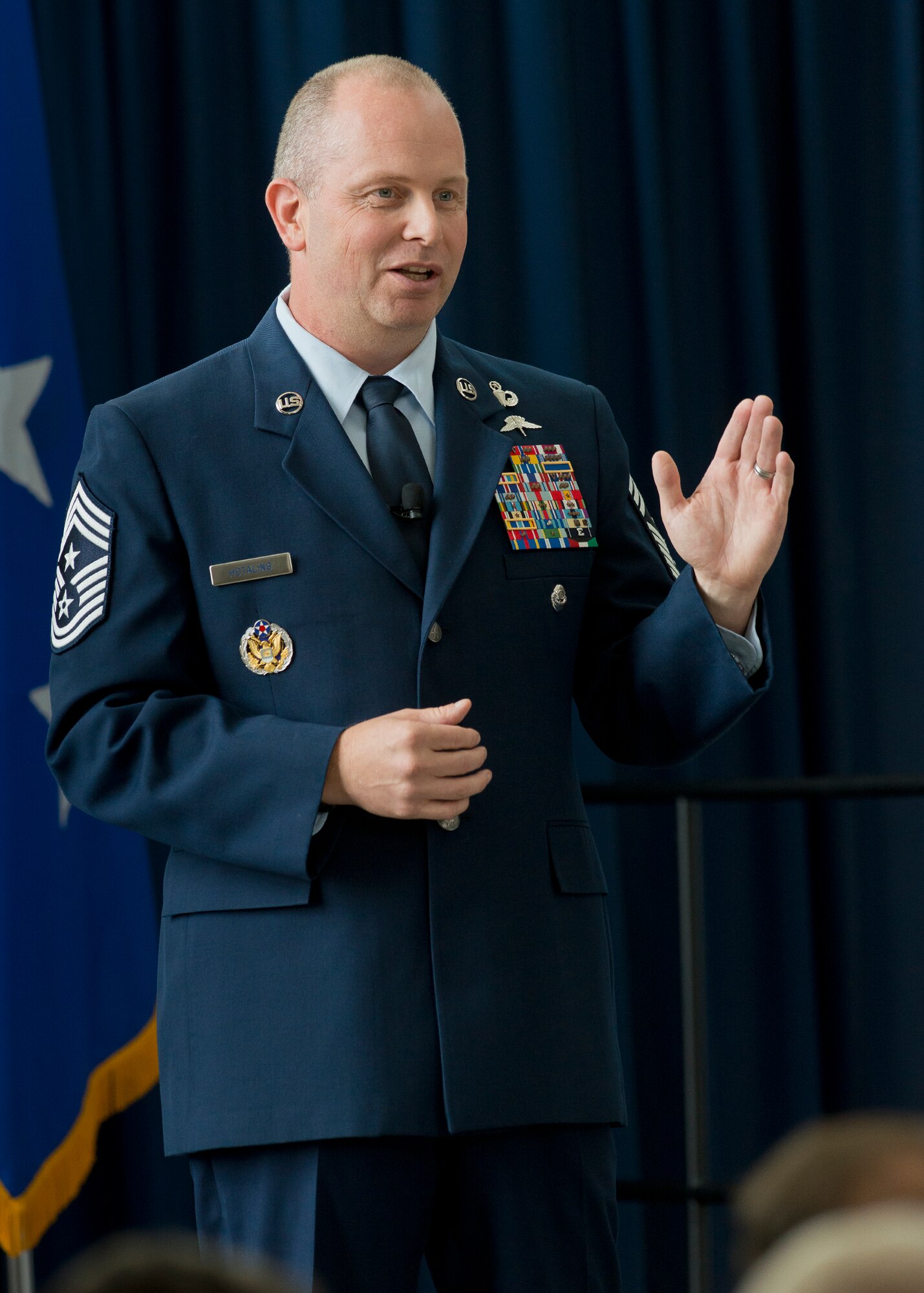 Chief Master Sgt. James W. Hotaling, the command chief master sergeant of the Air National Guard, addresses attendees during an All Call event Aug. 7, 2014 at Joint Base Andrews, Maryland. The purpose of the All Call is to recognize the ANG's Oustanding Airmen of the Year and it signifies the end to Focus on the Force Week, which gathers senior enlisted leaders to openly discuss concerns, receive feedback from the junior enlisted and tell the exceptional stories of ANG Airmen throughout the 50 states, territories and the District of Columbia. (Air National Guard photo by Master Sgt. Marvin R. Preston/Released)