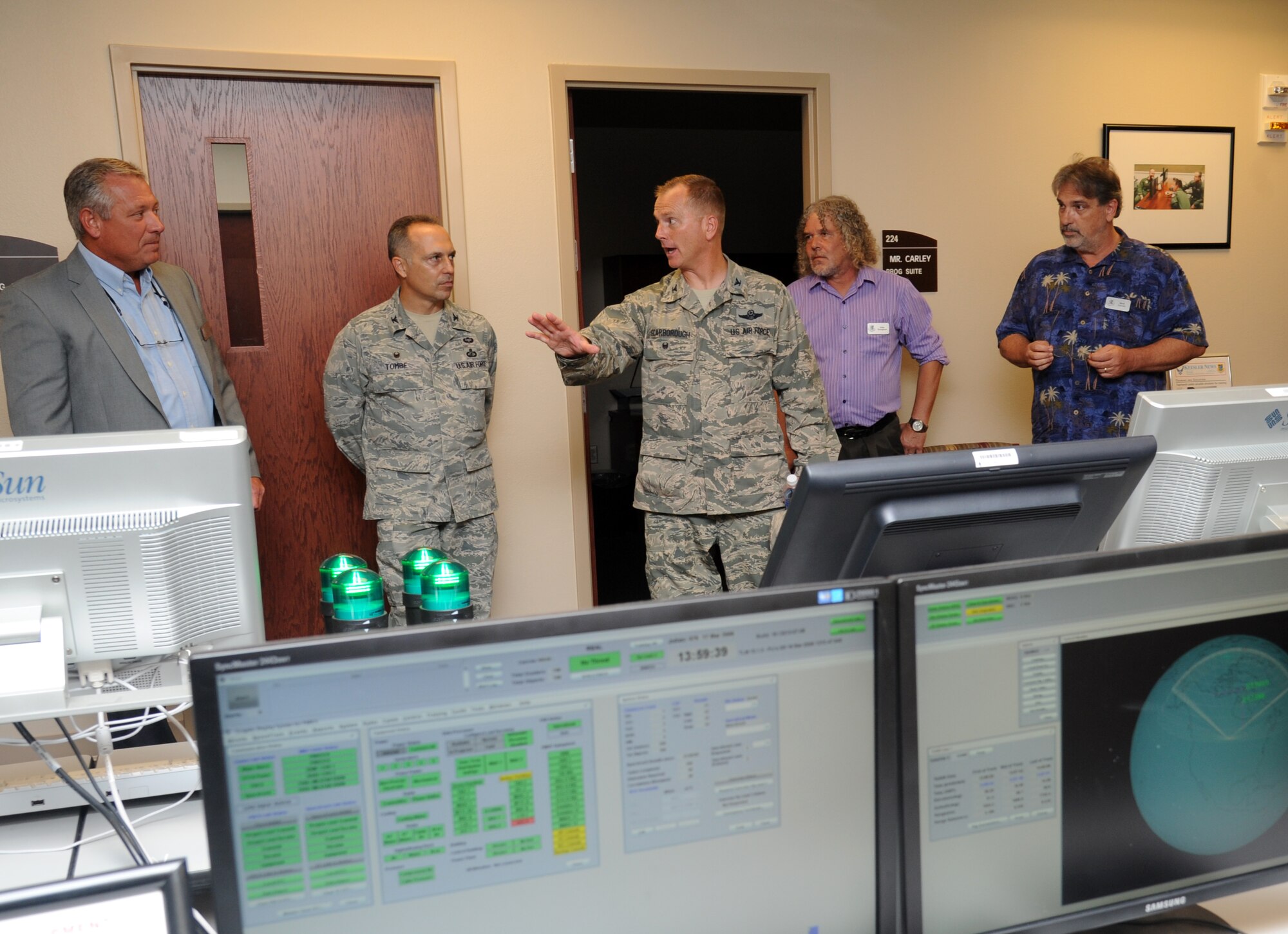 Col. Dennis Scarborough, incoming 81st Training Wing vice commander, visits the Trainer Development Center during an immersion tour of the 81st Training Group Aug. 8, 2014, at Keesler Air Force Base, Miss. The purpose of the tour was to learn the integration of the group’s mission, operations and personnel. (U.S. Air Force photo by Kemberly Groue)