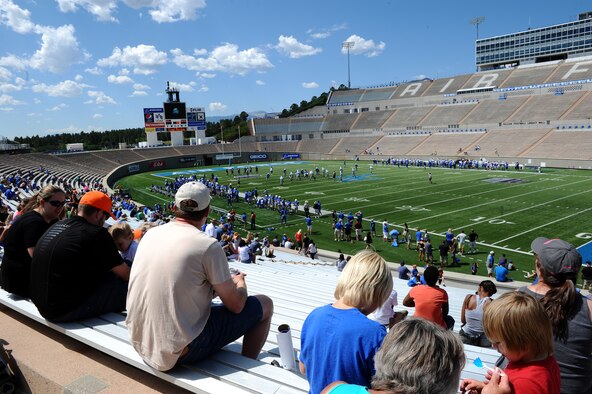 Approximately 2,000 Falcon football fans got the opportunity to get up close and personal with the team during the seventh annual Falcon Football Fan Day Aug. 9 at Falcon Stadium. Attendees of the event not only got to watch the practice, but enjoyed locker room tours, an inflatable fun zone, live music from the U.S. Air Force Academy Band, cheer and dance performances, and autographs with the team. (U.S. Air Force photo/Tech. Sgt. Heather Stanton)