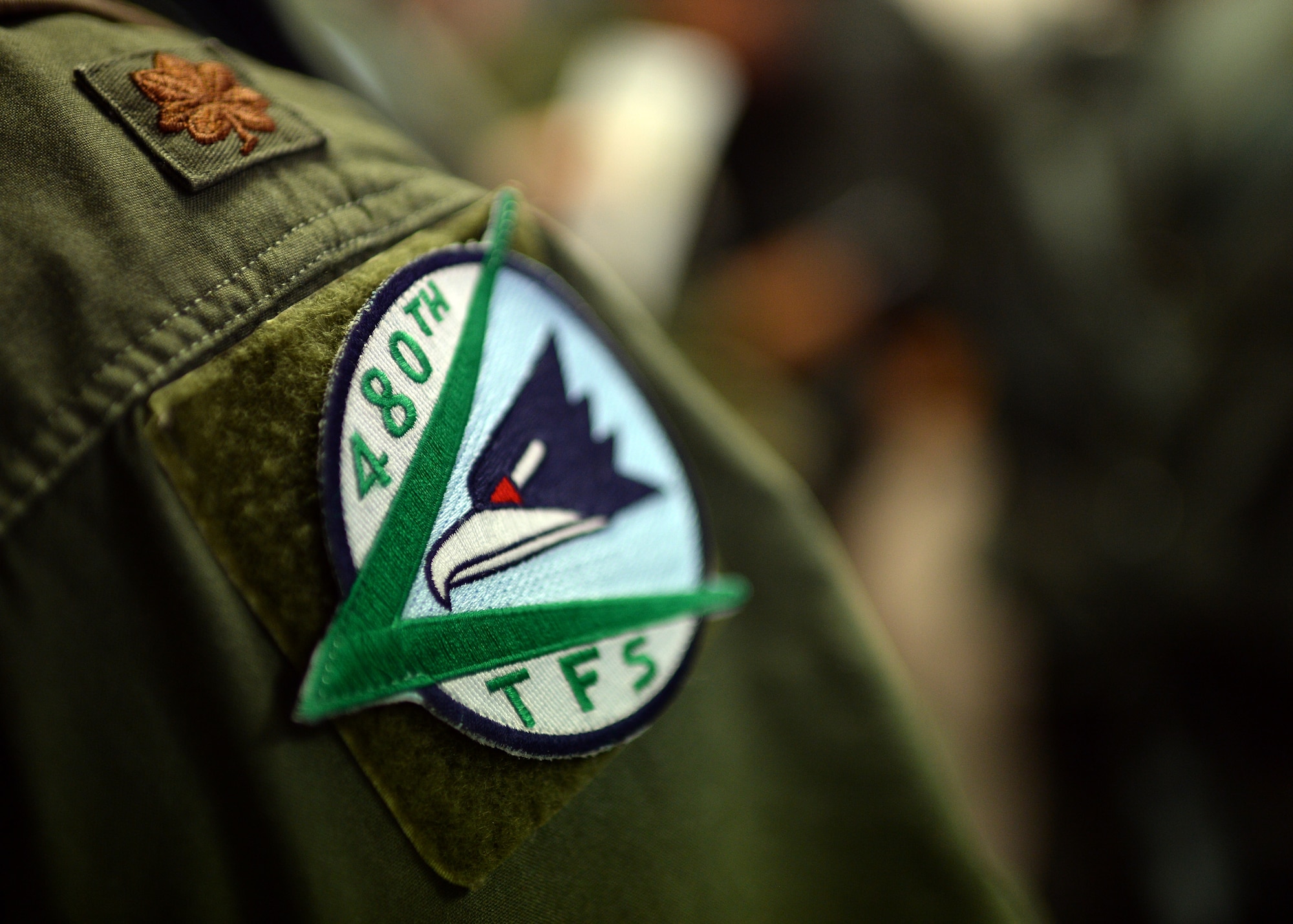 A 480th Fighter Squadron U.S. Air Force F-16 Fighting Falcon fighter aircraft pilot from Spangdahlem Air Base, Germany, displays a heritage patch Aug. 8, 2014, prior to flying to Souda Bay, Greece, to partner with his Hellenic air force counterparts during a training event Aug. 11-23 to enhance their military capability. (U.S. Air Force photo by Staff Sgt. Daryl Knee/Released)