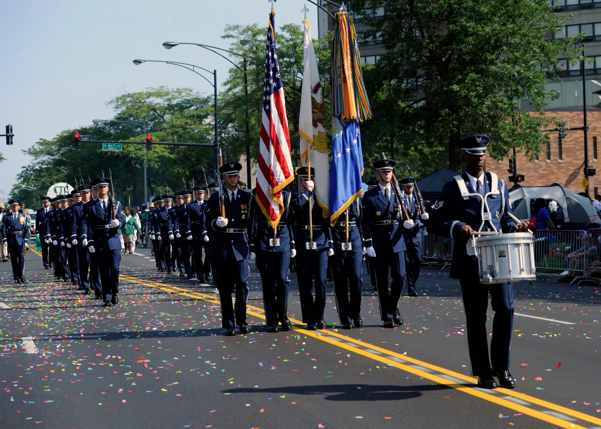 The United States Air Force Color Team leads the ceremonial guardsmen during the Bud Billiken Parade in Chicago, Il., August 9, 2014.  The USAF Honor Guard marched in front of a live and televised audience of millions of people. (U.S. Air Force photo/ Senior Airman Nesha Humes)