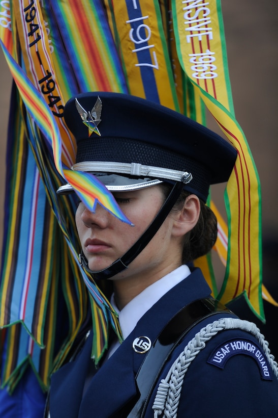Airman 1st Class Loryn Grieb, United States Air Force Color Team member, waits for the Bud Billiken Parade to start in Chicago, Il., August 9, 2014. The 40-person formation marched in front of a live and televised audience of millions of people. (U.S. Air Force photo/ Senior Airman Nesha Humes)