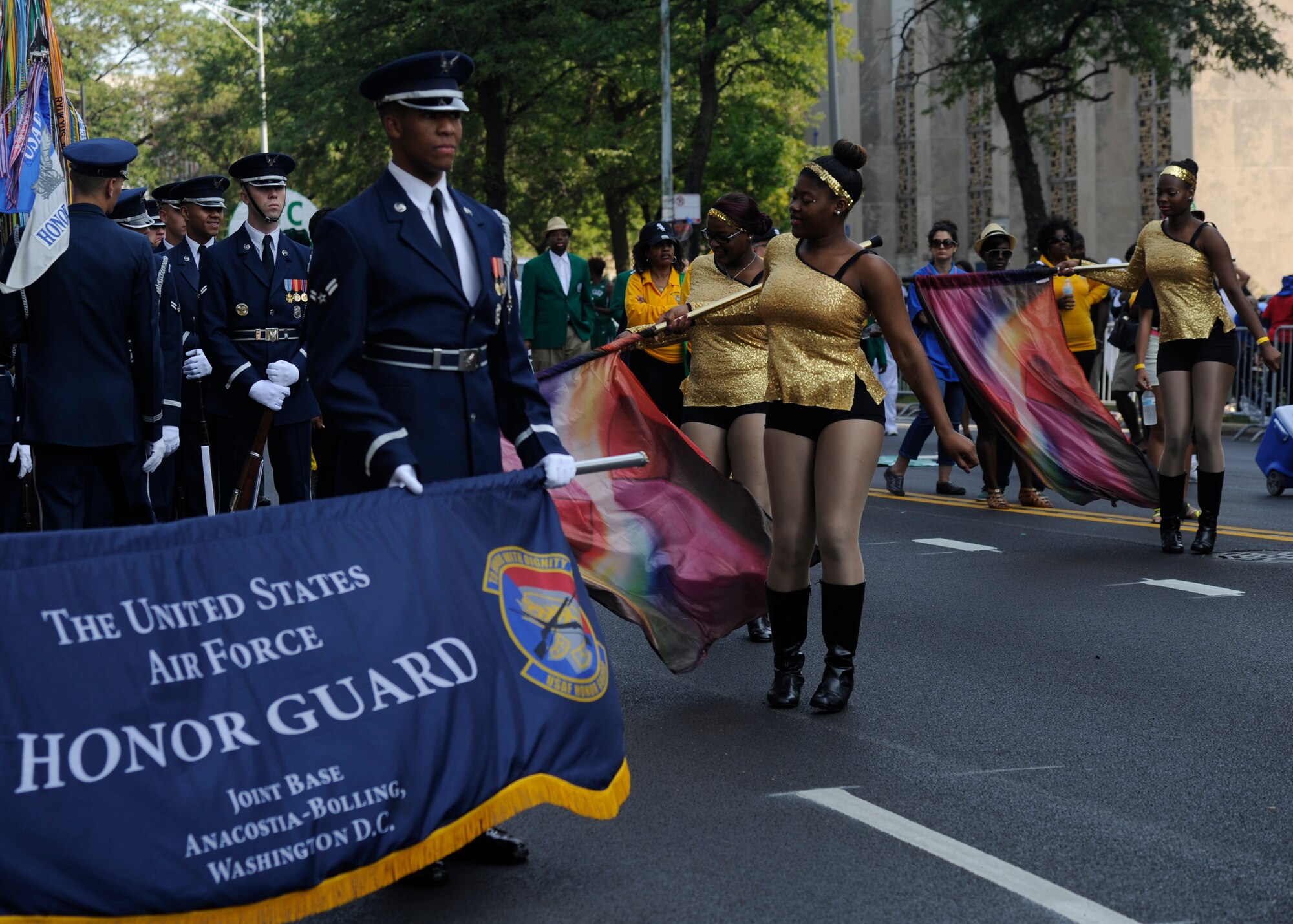Airman 1st Class Shawn Skeetfoster, United States Air Force pallbearer waits for the Bud Billiken Parade to start in Chicago, Il., August 9, 2014. The Bud Billiken Parade is the second largest and longest continuous education parade in the U.S., highlighting the significance of education by providing underprivileged children the chance to be in the spotlight. (U.S. Air Force photo/ Senior Airman Nesha Humes)