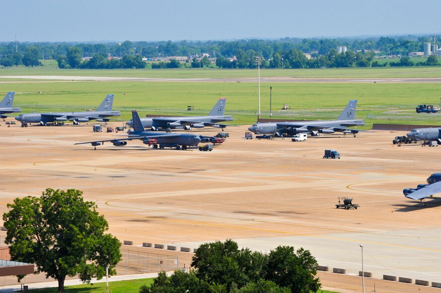 B-52H Stratofortresses sit on the flightline on Barksdale Air Force Base, La., Aug. 8, 2014. Air traffic controllers monitor the distance between airborne aircraft and aircraft on the ground as well as moving vehicles to ensure the safety of all Airmen who carry out the mission on the flightline. (U.S. Air Force photo/Airman 1st Class Benjamin Raughton)