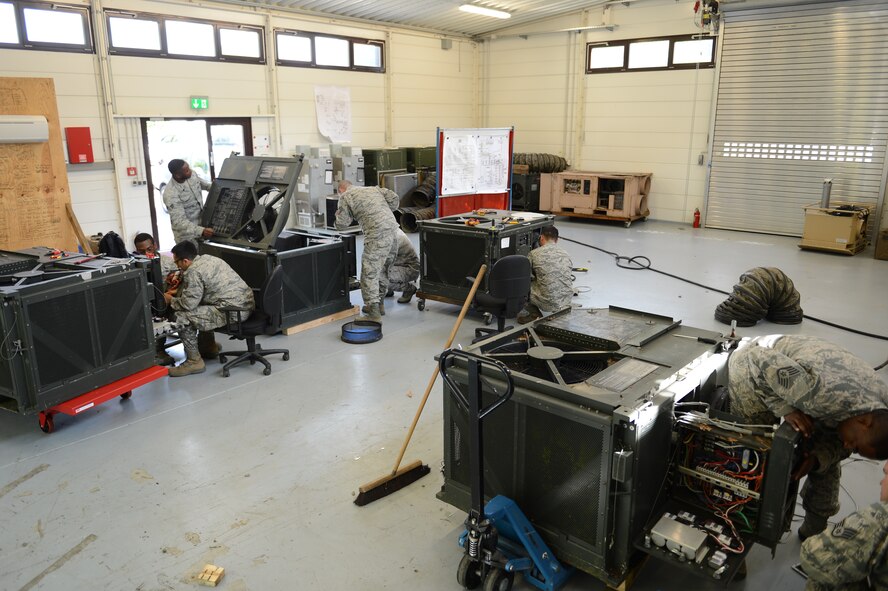Heating ventilation air condition Airmen work on field-deployable, environmental-control units during a seven-day heating, ventilation and air conditioning course on Ramstein Air Base, Germany, Aug. 6, 2014. From keeping computers from overheating to ensuring food doesn’t spoil, temperature regulation is a vital part of Air Force mission success. (U.S. Air Force photo/Airman 1st Class Michael Stuart)