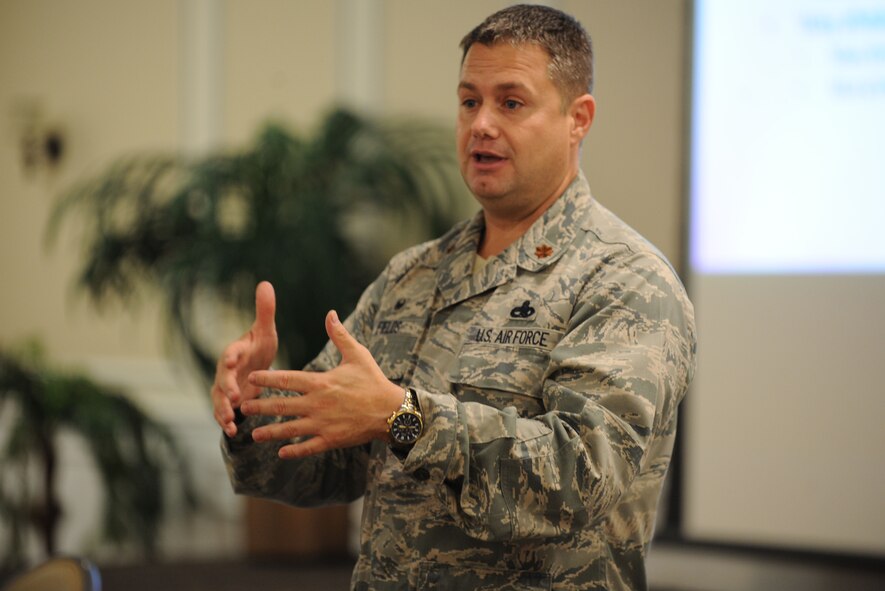 U.S. Air Force Maj. Michael Fields, 20th Aircraft Maintenance Squadron commander, address 20th AMXS spouses about various services he could provide at Shaw Air Force Base, S.C., Aug. 5, 2014. Fields said one of his main goals is to ensure Airmen get time with their families. (U.S. Air Force photo by Airman 1st Class Michael Cossaboom/Released)
