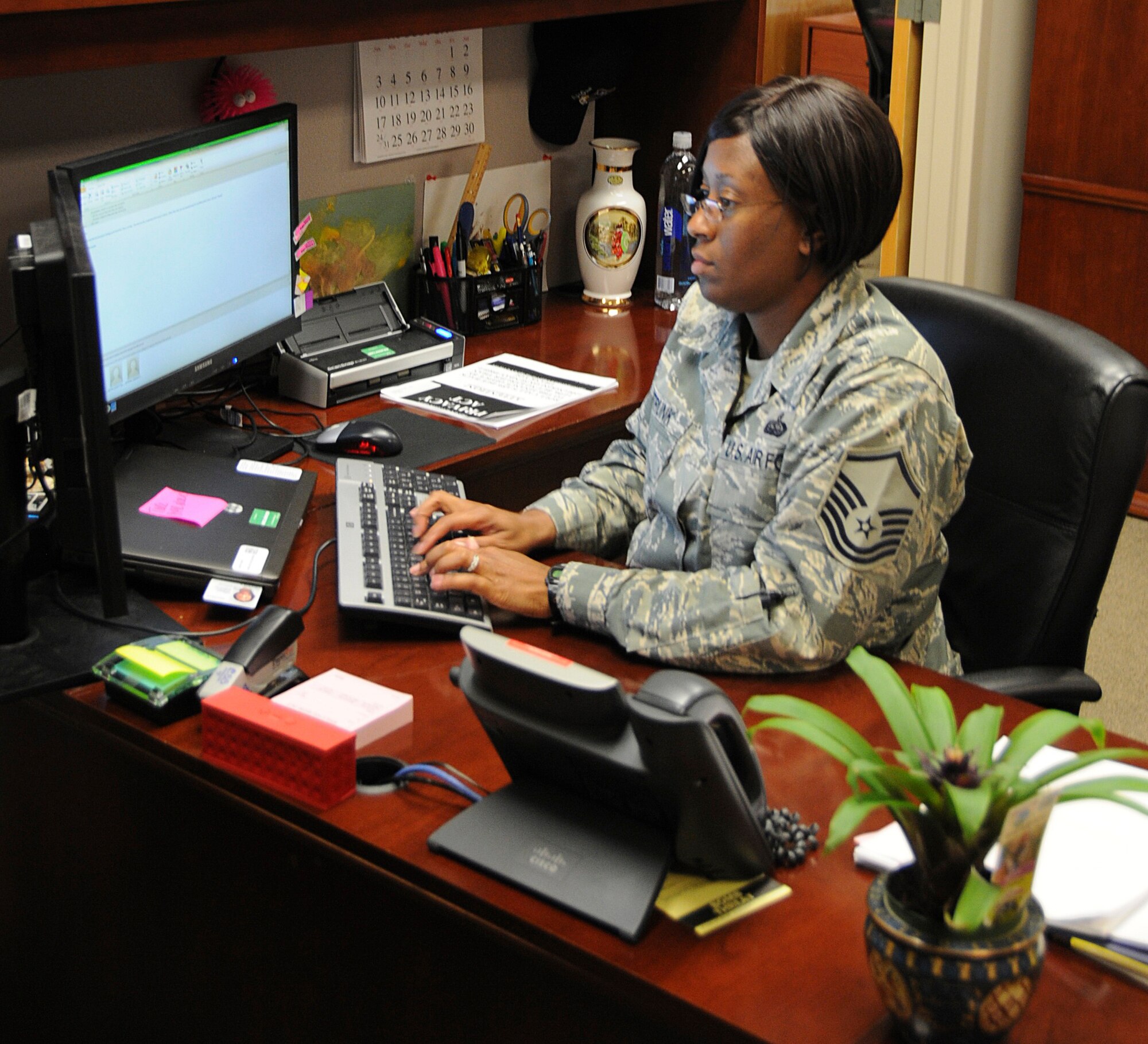 U.S. Air Force Master Sgt. Lakeisha Sistrunk, NCOIC of the Commanders Executive Support Staff, updates the Wing Unit Training Assembly schedule over drill weekend. Sistrunk provides administrative support to the fighter wing staff and Wing Commander. Some of her responsibilities include knowledge operations management, processing military orders, roll call and seamless customer service to the fighter wing. Additionally, she serves as one of two primary liaisons for the Commander ensuring communications and active requirements are distributed to leadership; guaranteeing minimal disruption to the overall operations of the wing. (U.S. Air National Guard photo by Capt. Craig Carper/Released)