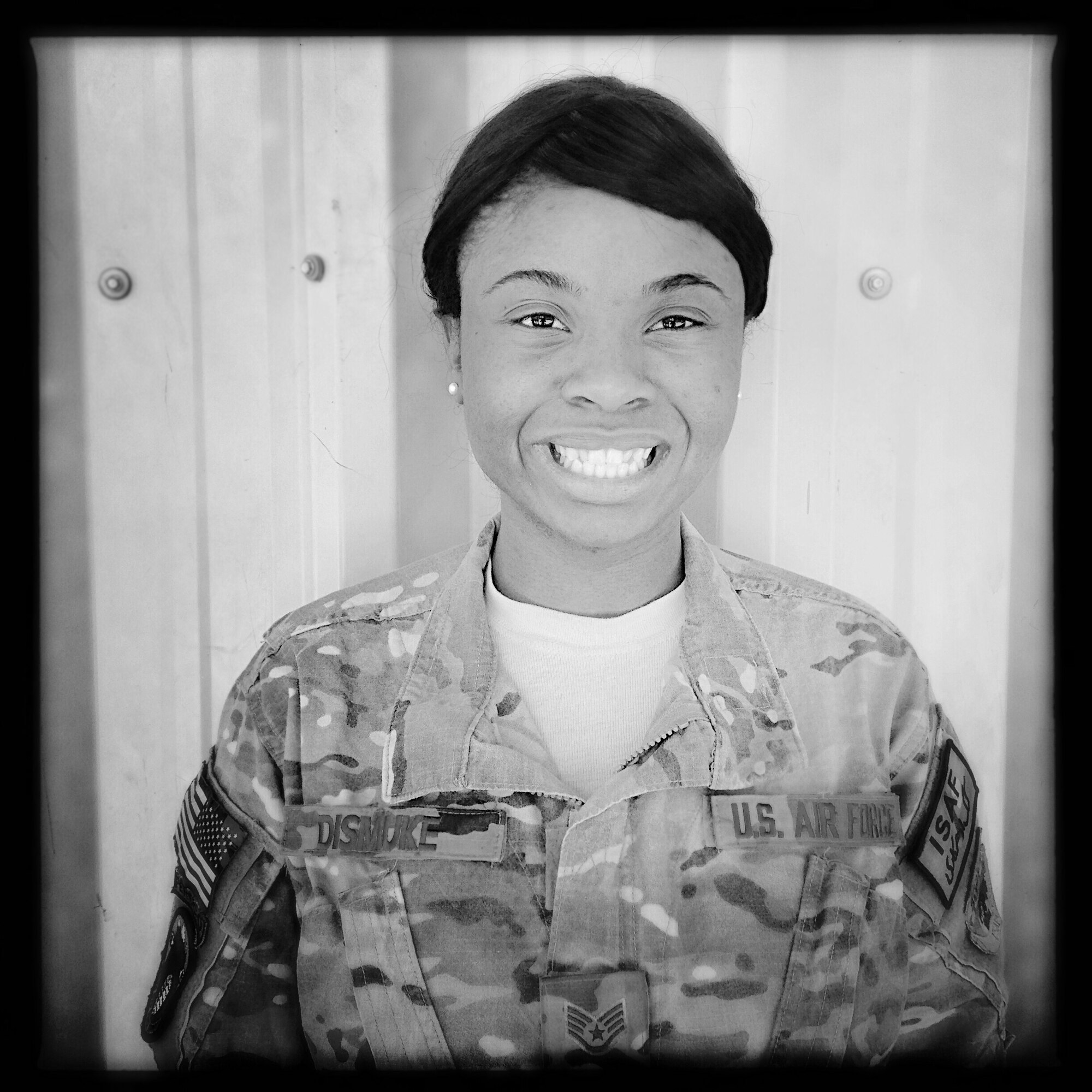 "I am Staff Sgt. Gorgeous Dismuke and I contribute to the Air Force by providing NATO medals and certificates to each member assigned to Bagram Air Field, Afghanistan." (U.S. photo illustration by Staff Sgt. Evelyn Chavez/Released)