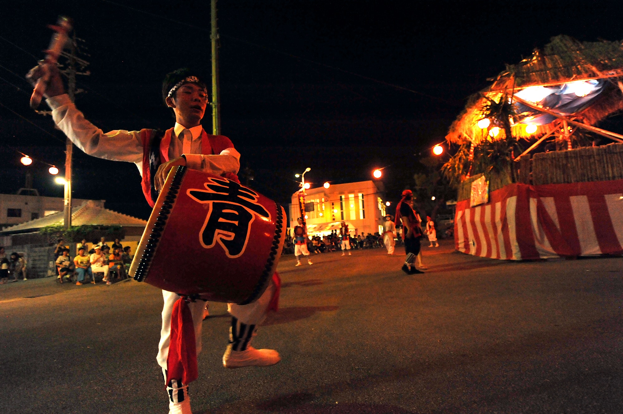Okinawan families their ancestors during Obon > Pacific Air